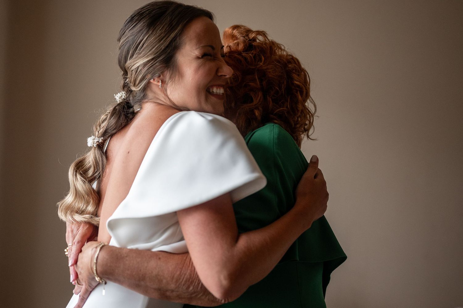 A series of romantic wedding photos showing tender embraces between the couple in formal attire.