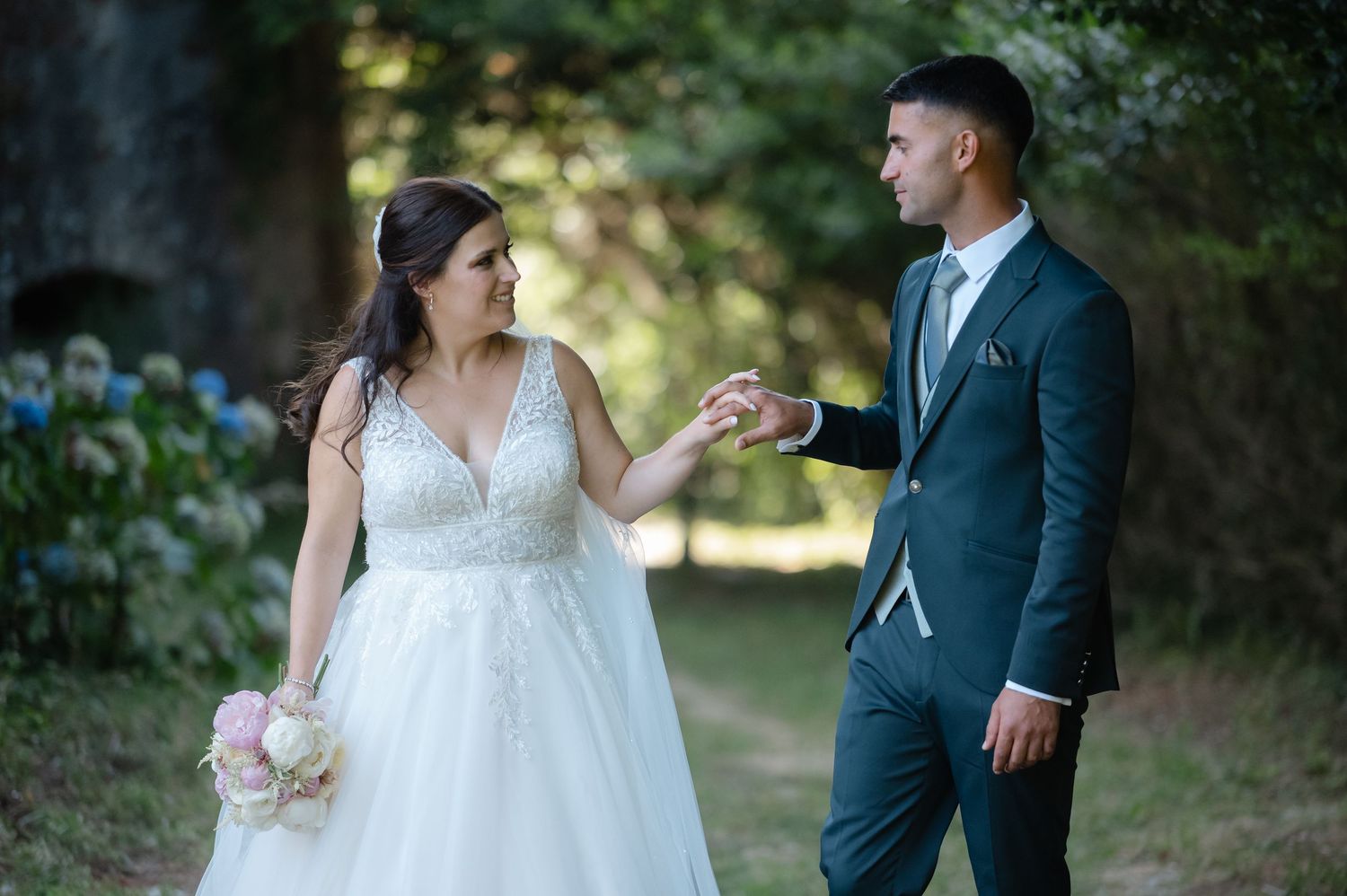 A romantic wedding photoshoot sequence showing tender moments between newlyweds in a sunlit outdoor setting.