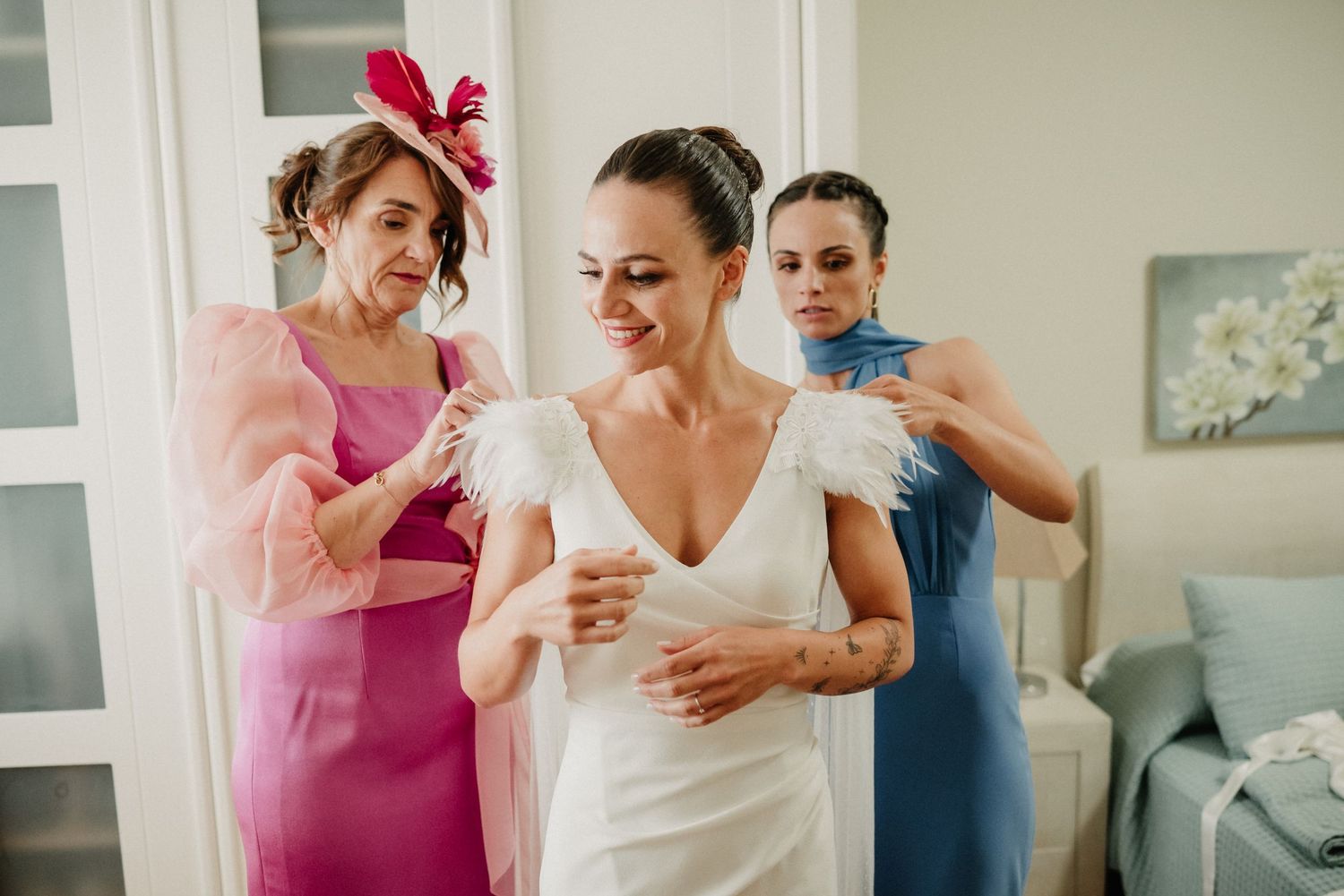 Wedding preparation scene showing joyful moments in a bright, modern room.