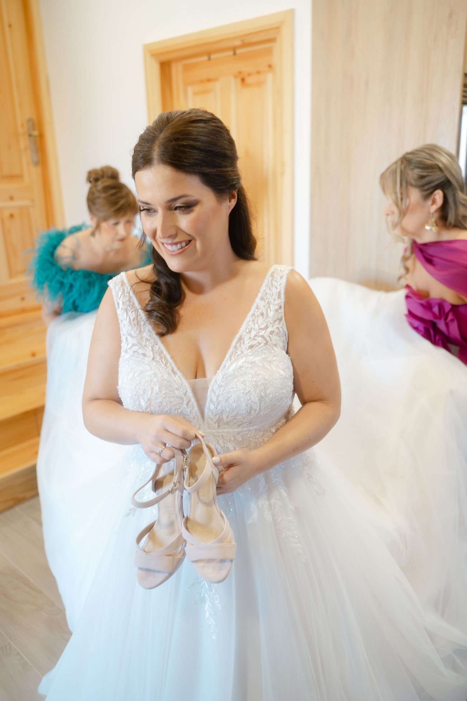 A series of photos showing someone in a white wedding dress putting on ballet slippers for their special day.