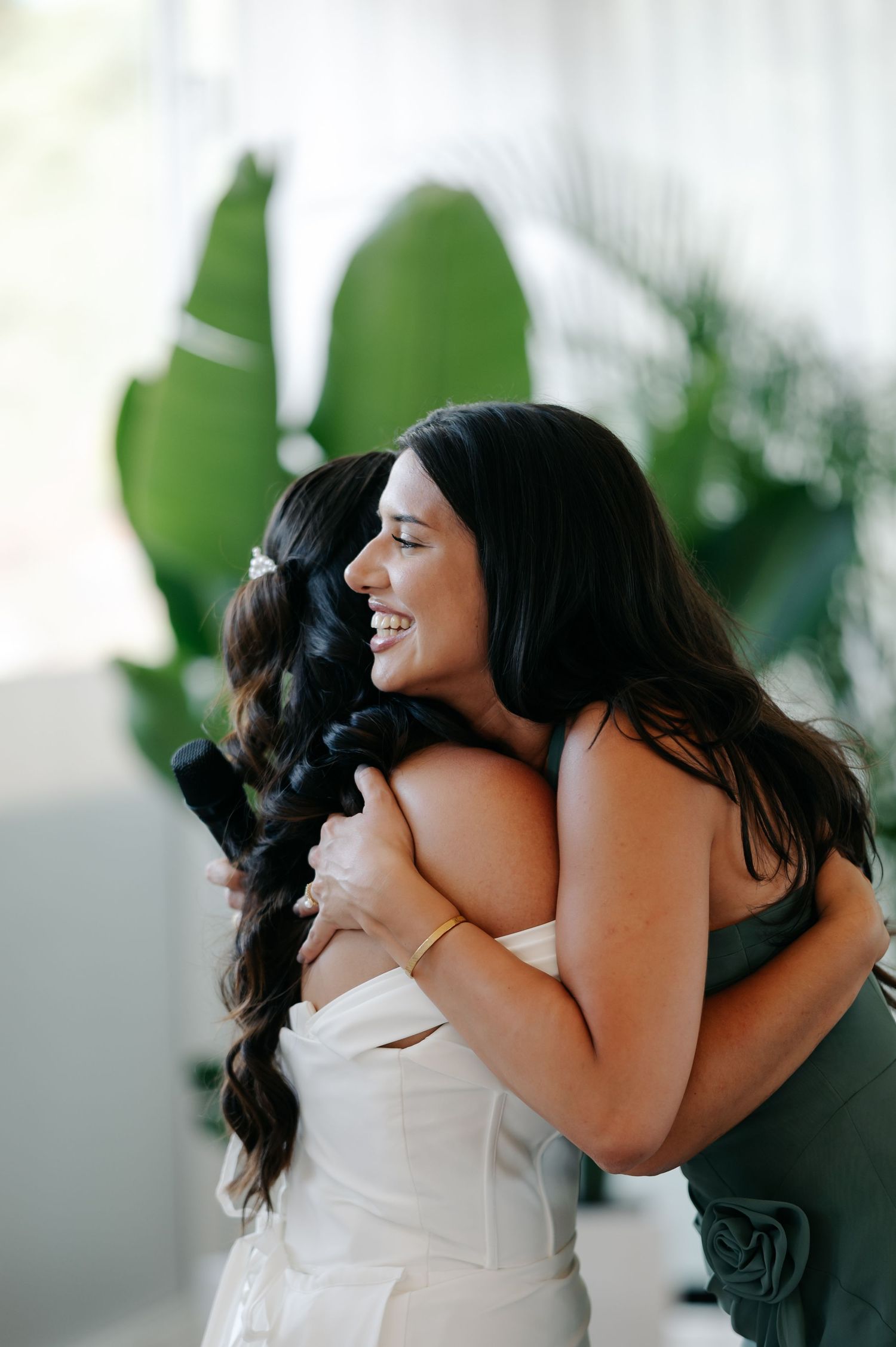 Emotional wedding celebration captured in sequence as two people share an intimate embrace.