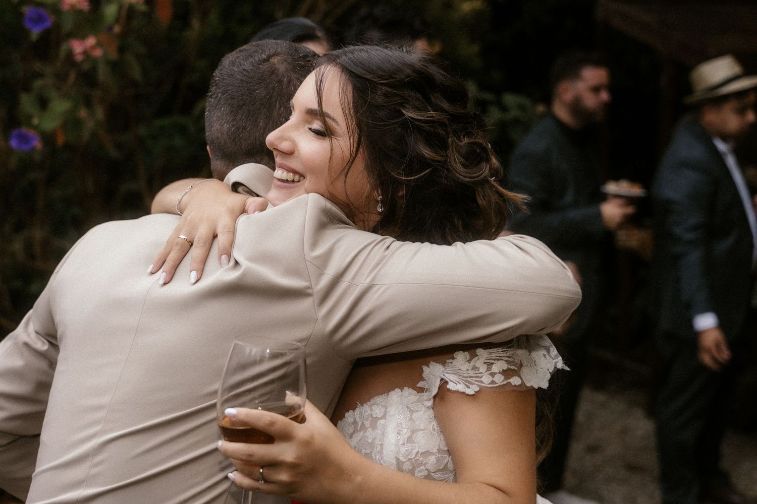 Newlywed couple sharing tender embraces and intimate moments during their wedding celebration.