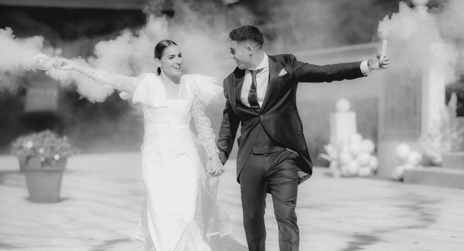 Black and white wedding photos showing dancing and celebration moments.