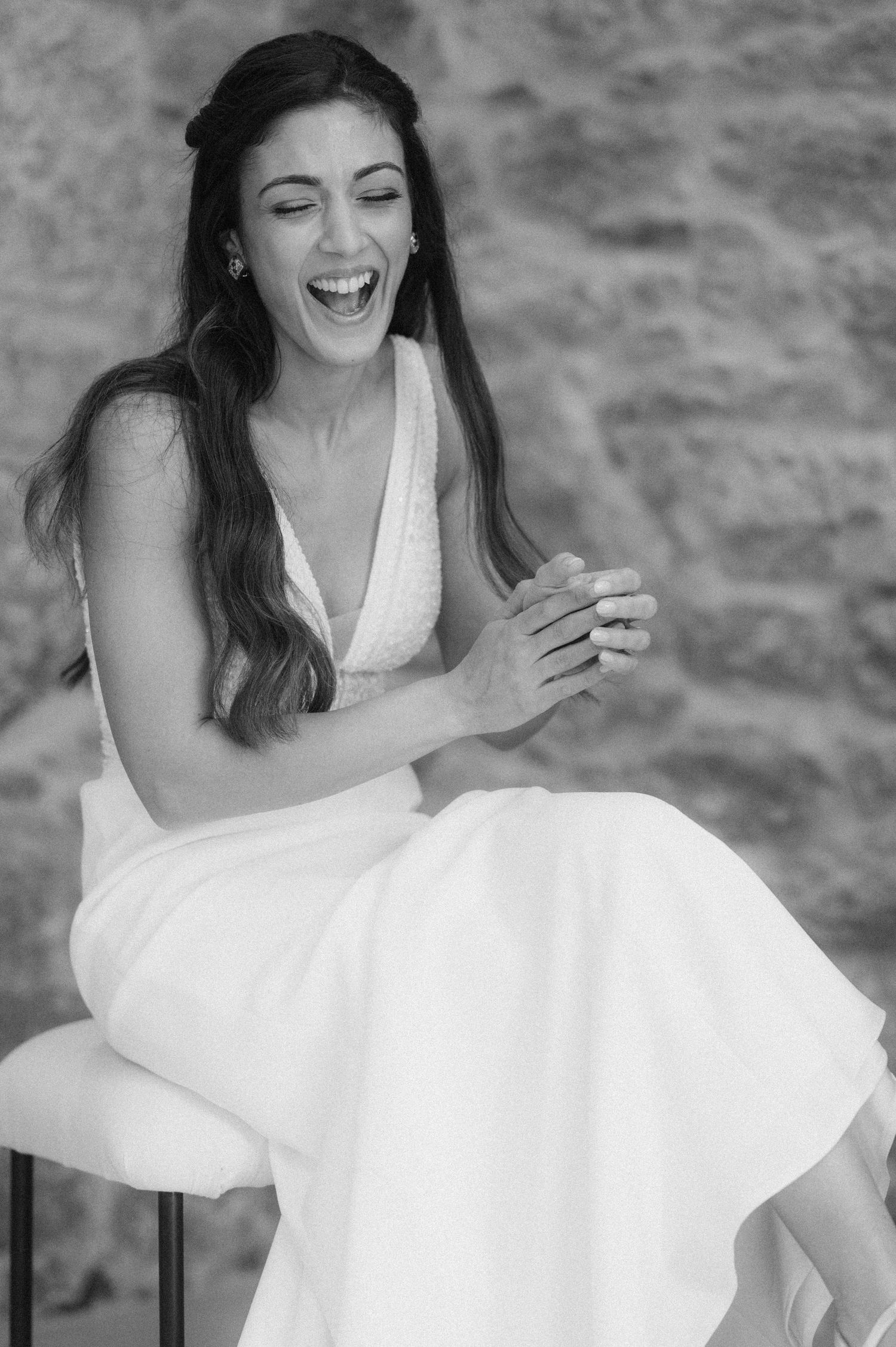 A joyful sequence showing someone in a white dress twirling and laughing.