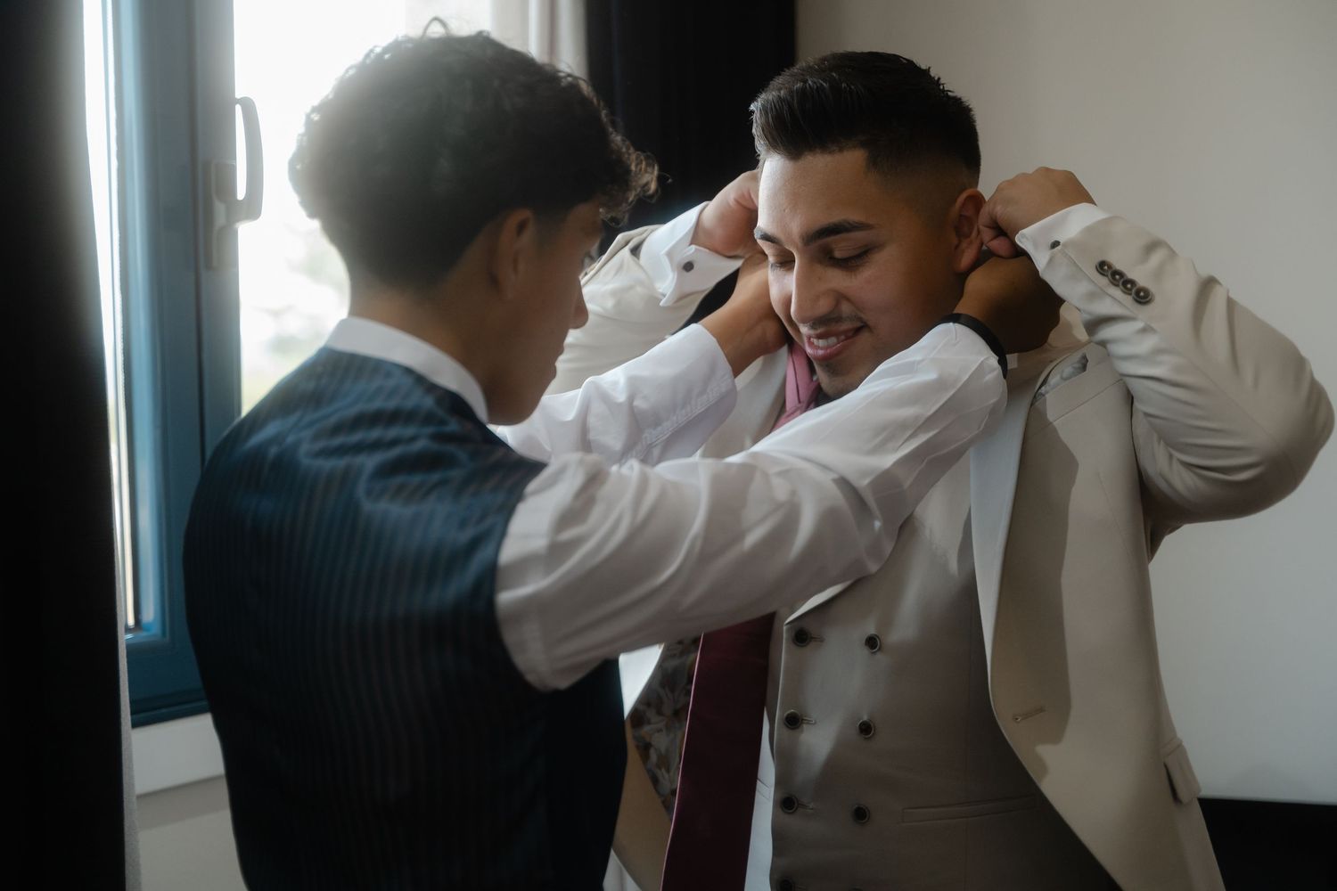 A series of candid photos showing someone in a white chef's coat getting ready in front of a mirror.