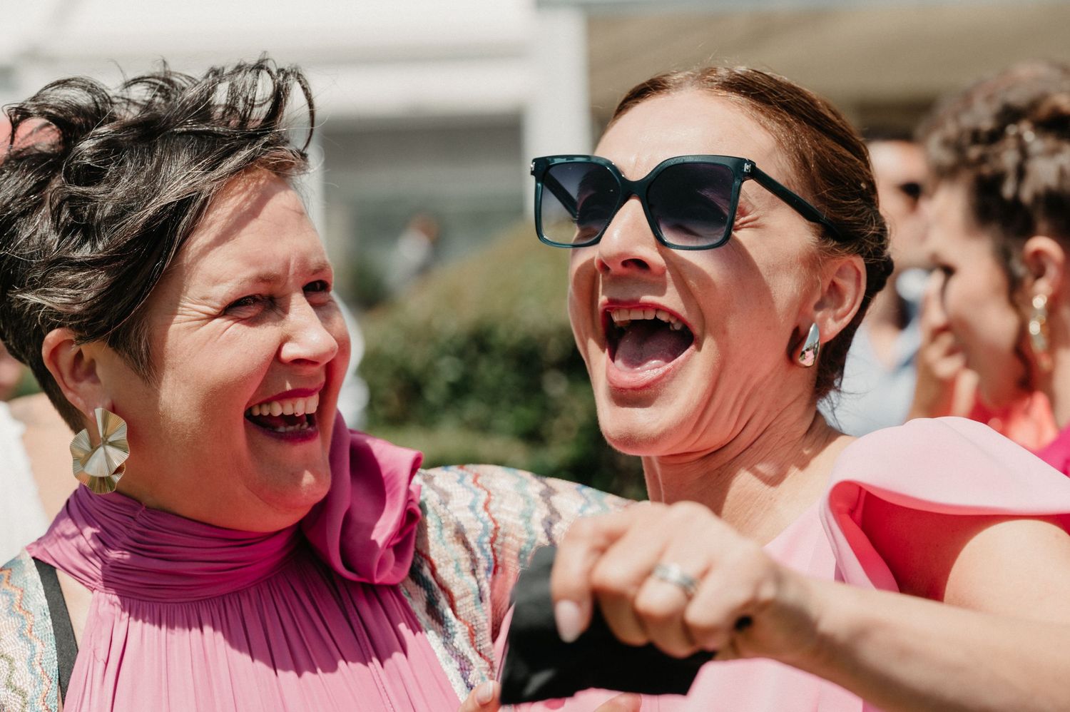 A series of candid moments showing people laughing joyfully at an outdoor gathering.