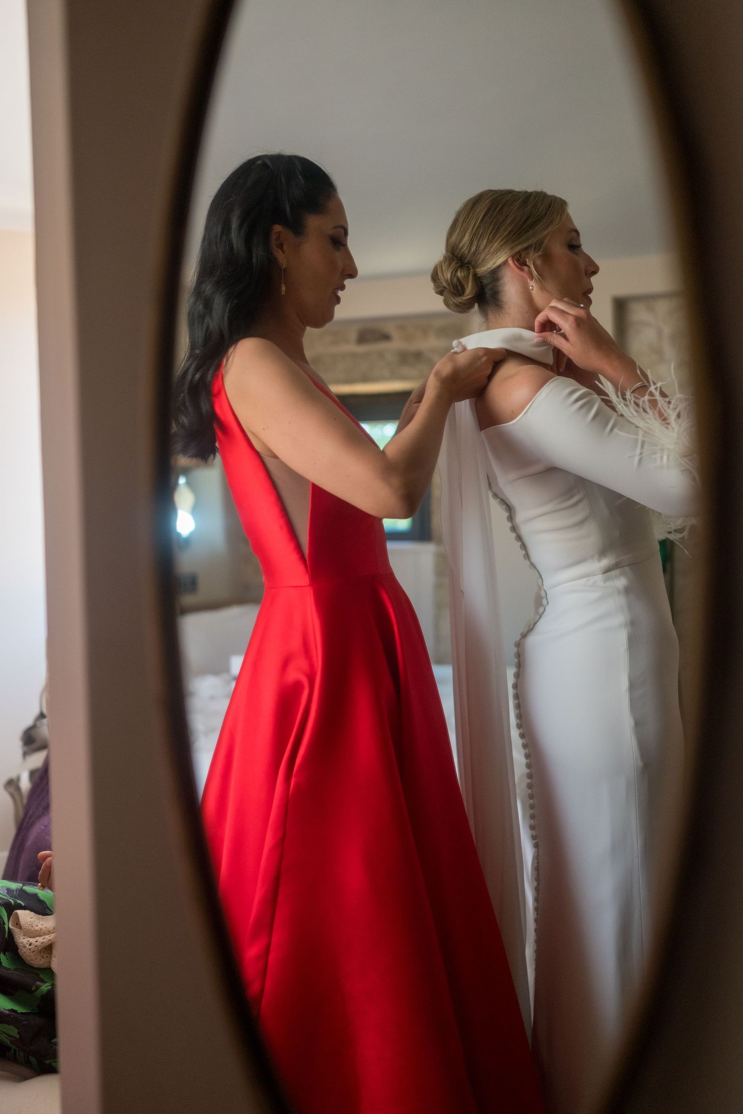A series of candid shots showing preparations with someone in a white gown and another in a bright red dress.