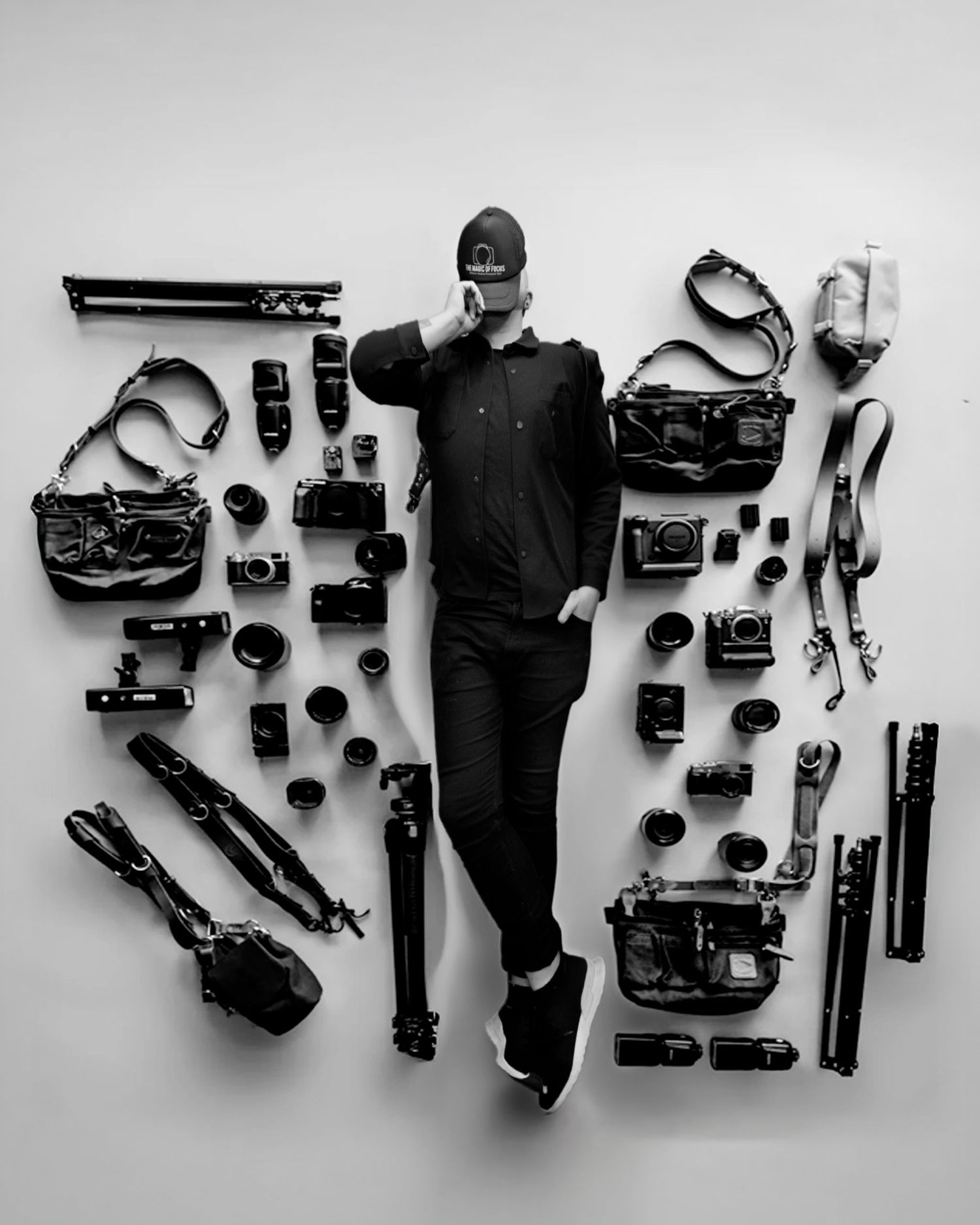 A black and white photo series showing various camera equipment and photography gear laid out in knolling style arrangement.
