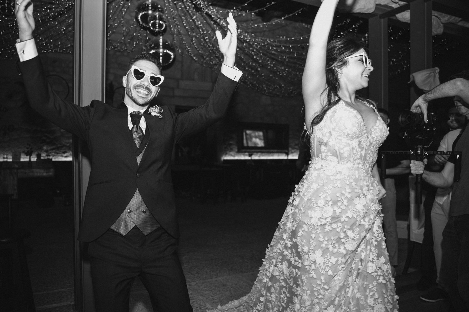 Black and white vintage wedding reception photos showing dancing and celebration moments.