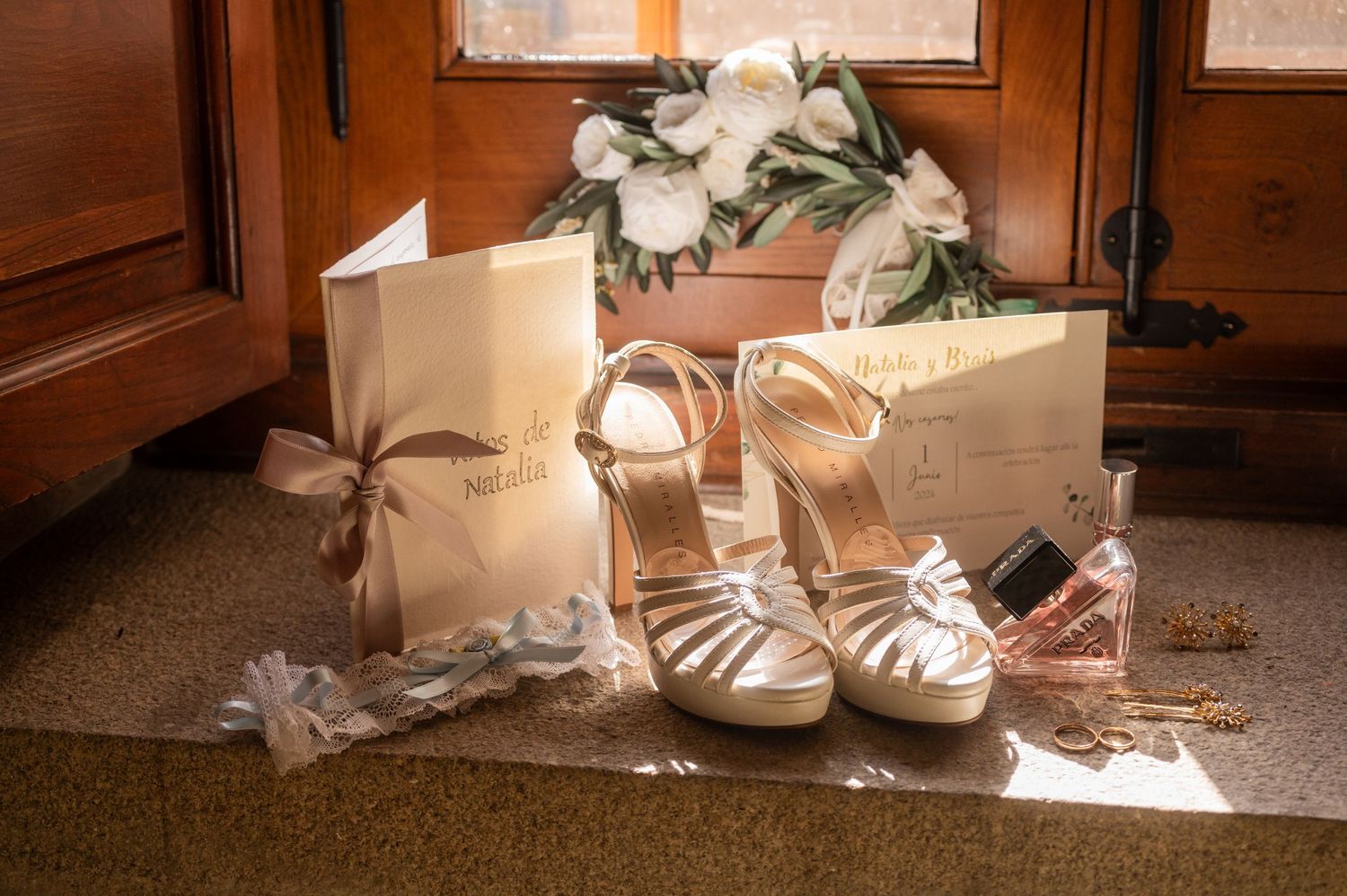 A collage of wedding details including white shoes, invitations, and decor items arranged on wooden surfaces.