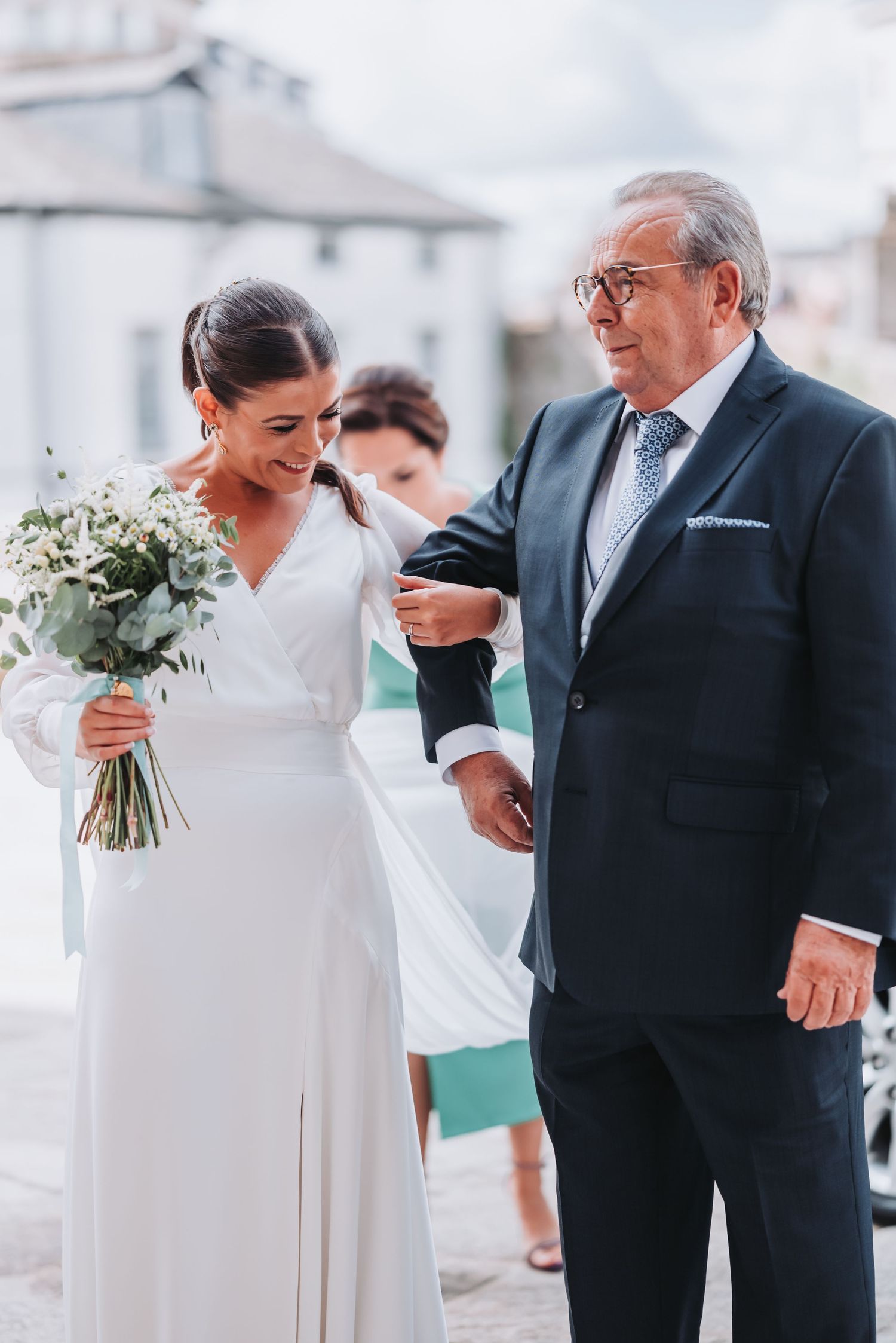A series of candid wedding moments showing tender interactions between a couple and guests in an outdoor setting.