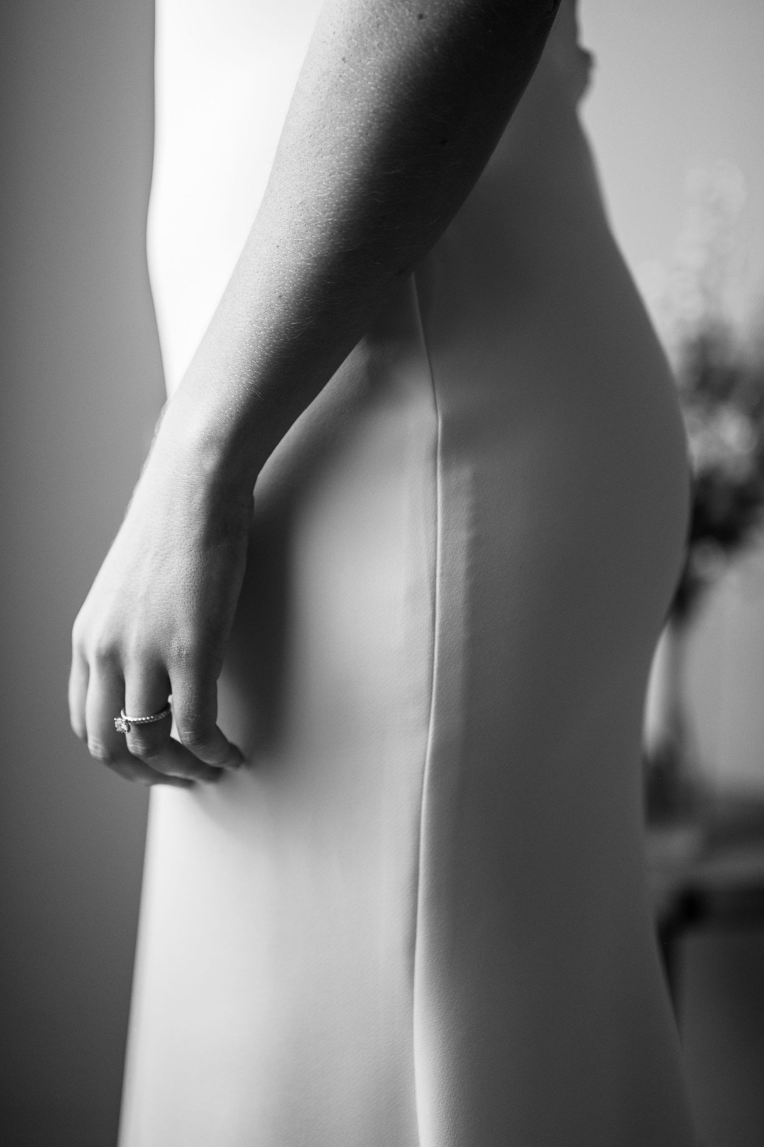 Abstract black and white artistic nude photography series showing graceful body curves and forms.