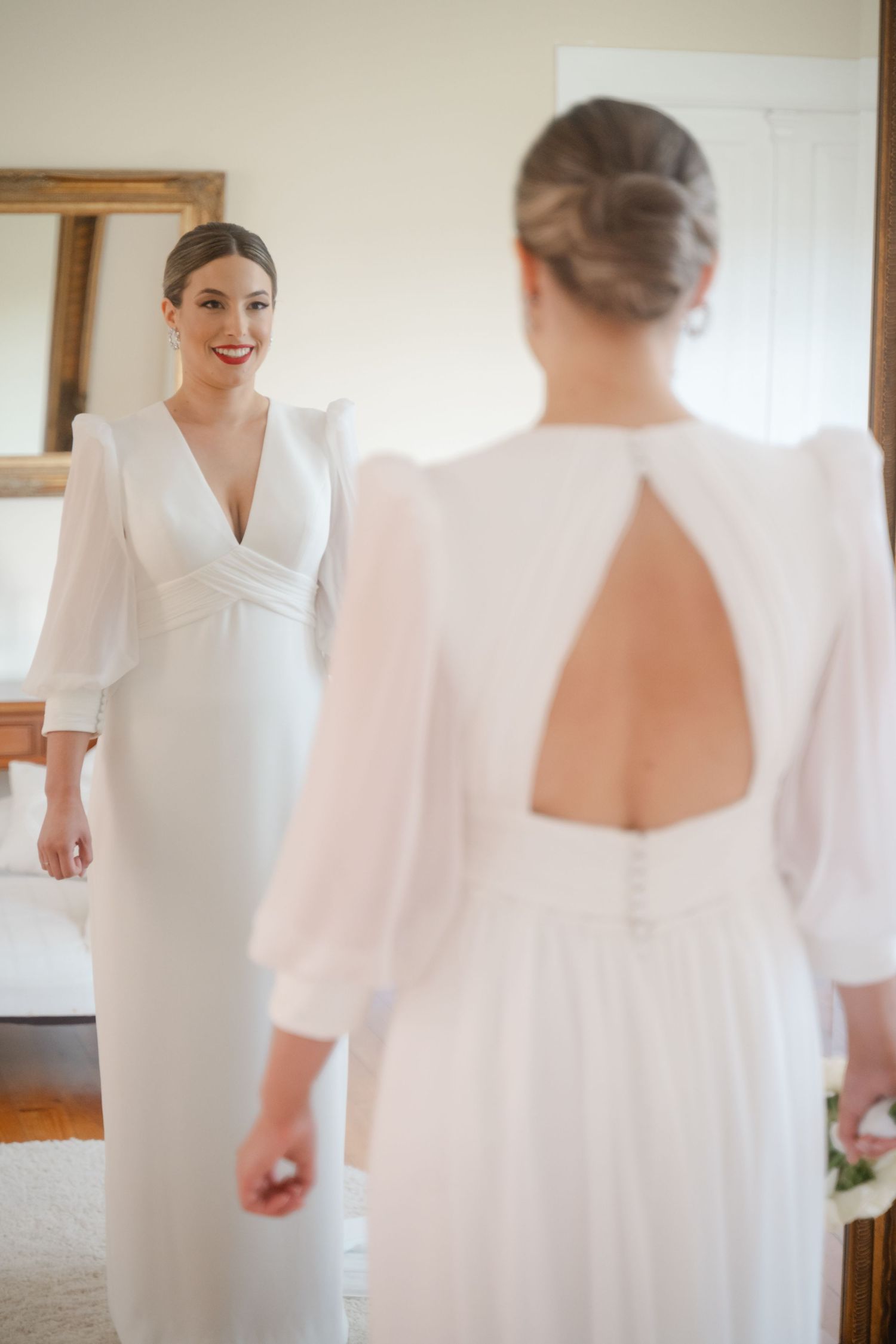 A bride in an elegant white wedding dress with short puff sleeves is captured in a series of candid moments.