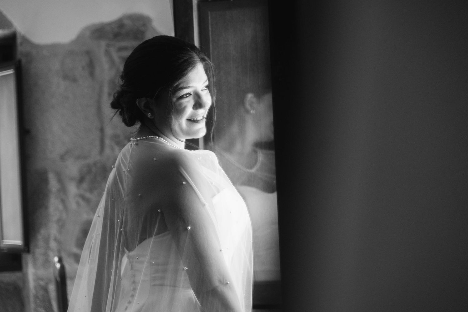 A black and white photo collage shows a bride in a wedding dress from multiple angles.