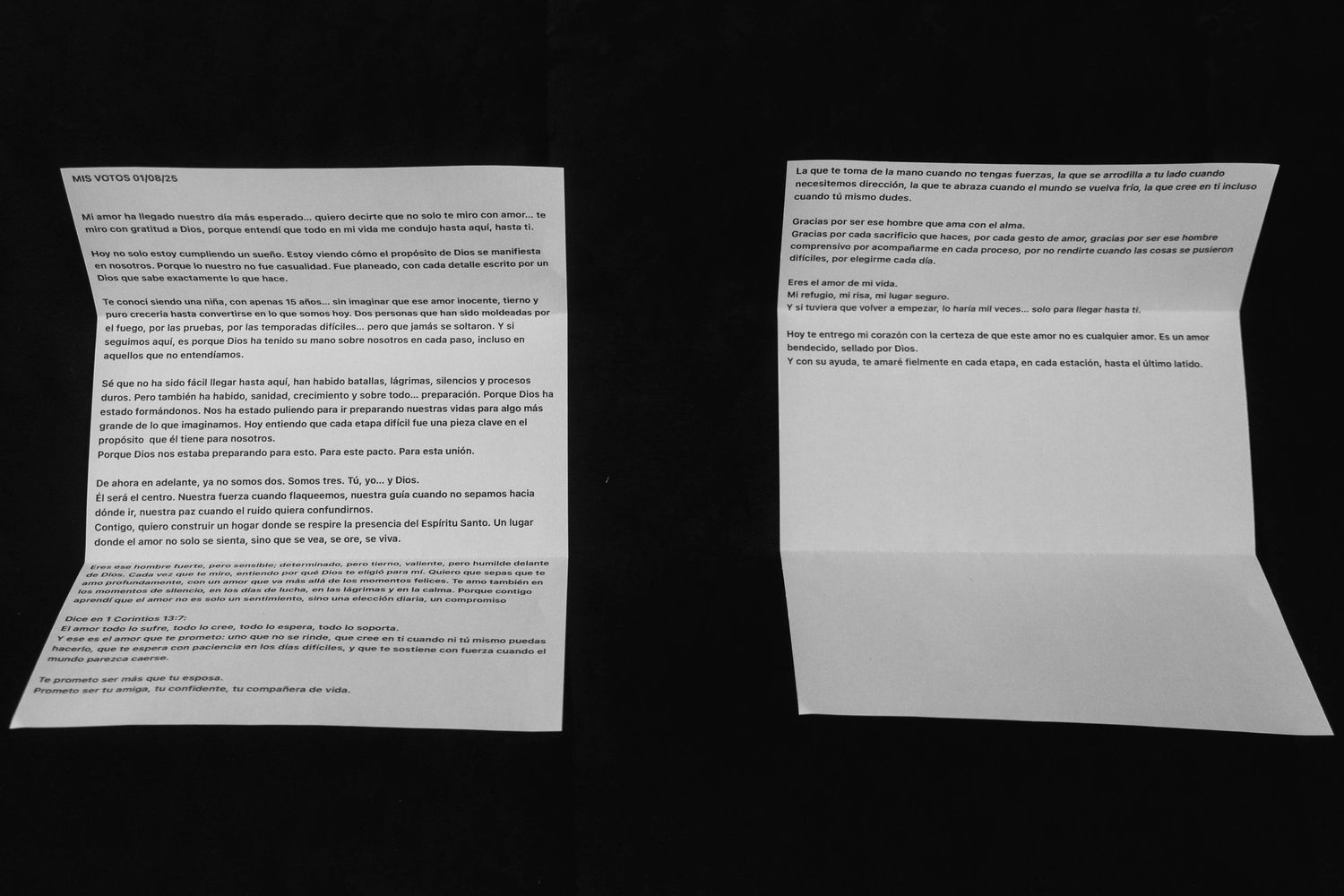 A series of white paper documents laid out in a row against a black background.