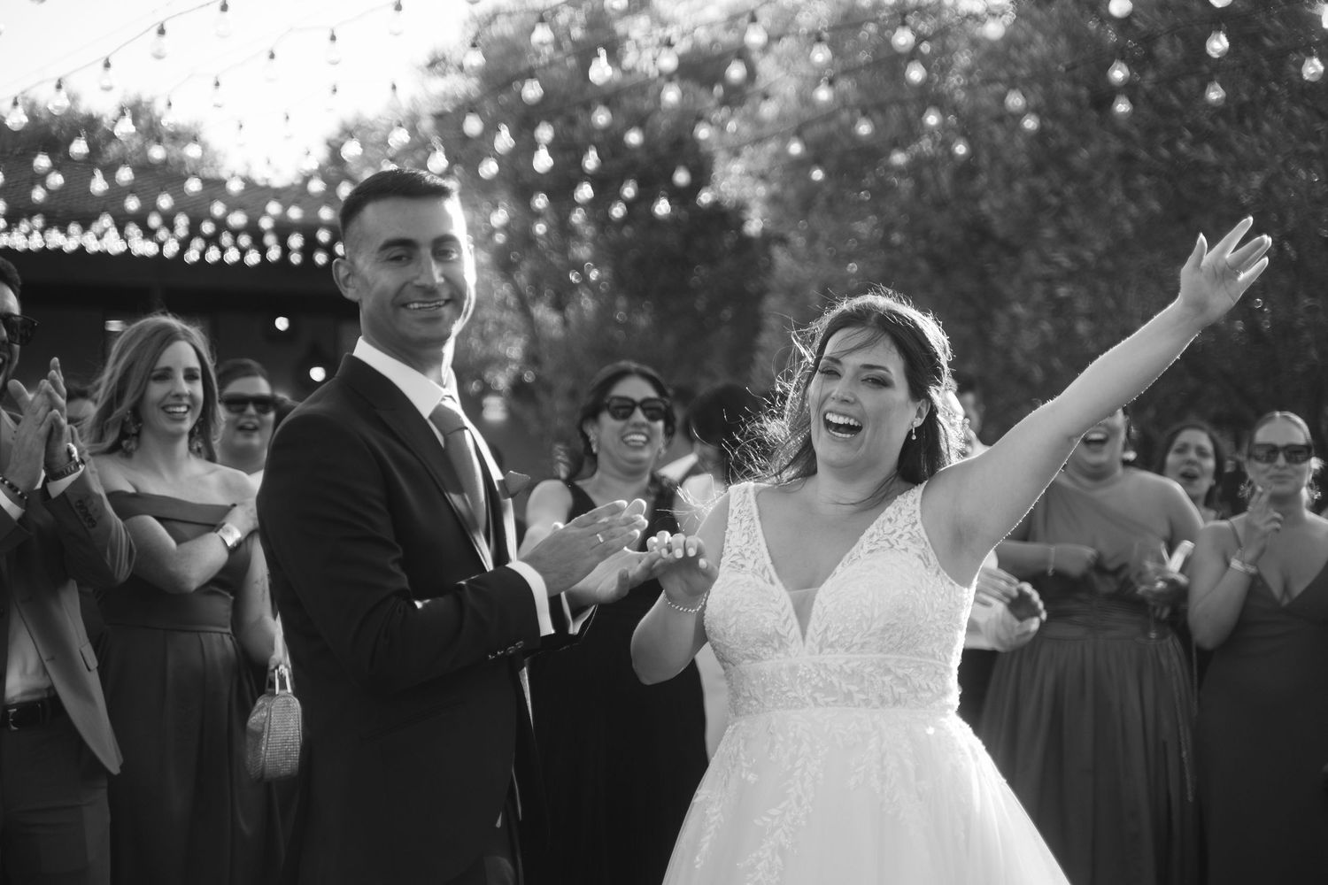 A series of black and white photos showing joyful moments at an outdoor celebration.