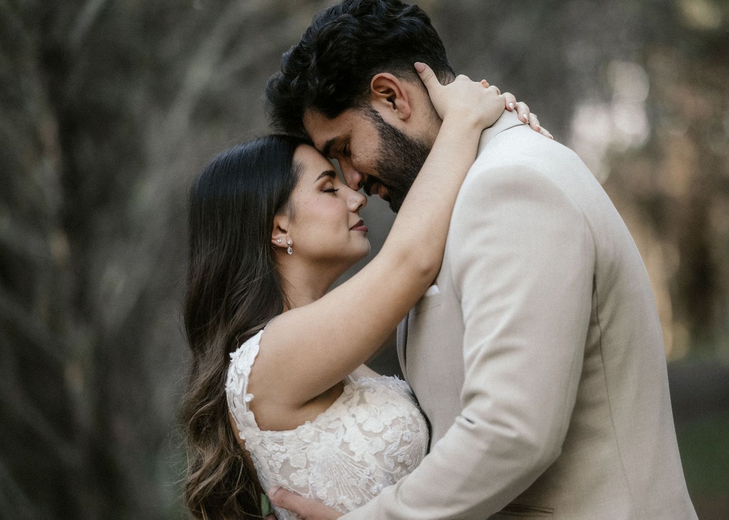 A romantic wedding photo series showing intimate moments between a couple in an outdoor setting.