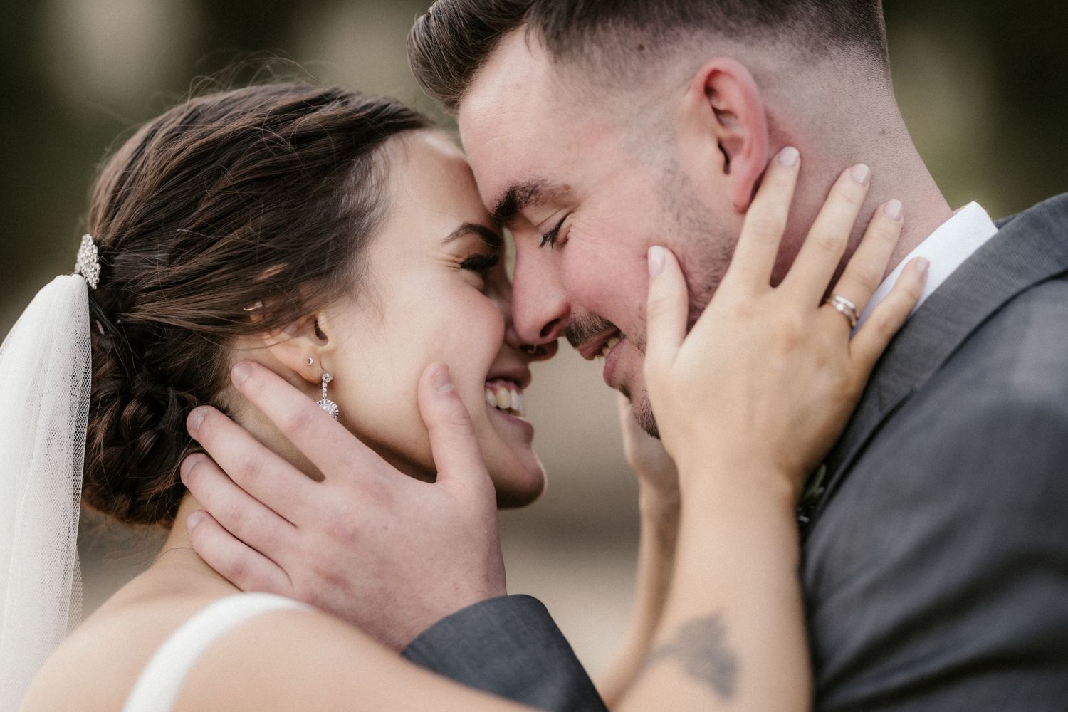 Black and white wedding photos showing intimate moments between newlyweds in a romantic sequence.