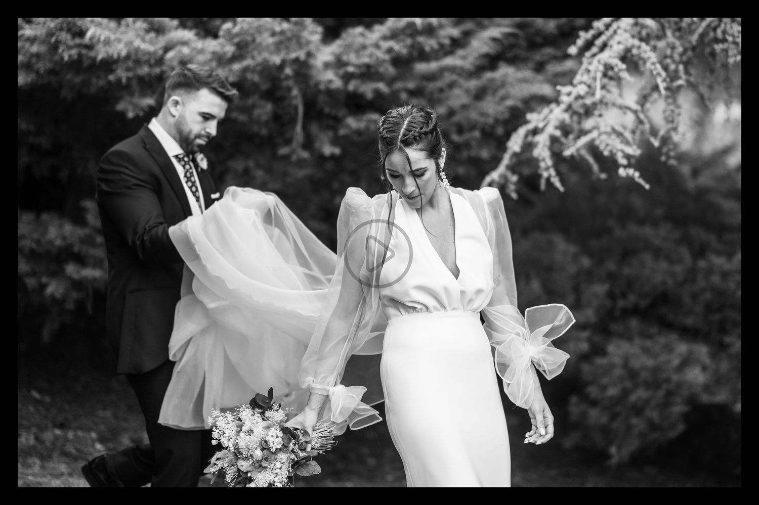 Romantic black and white wedding photo series showing joyful moments between newlyweds dancing and embracing outdoors.