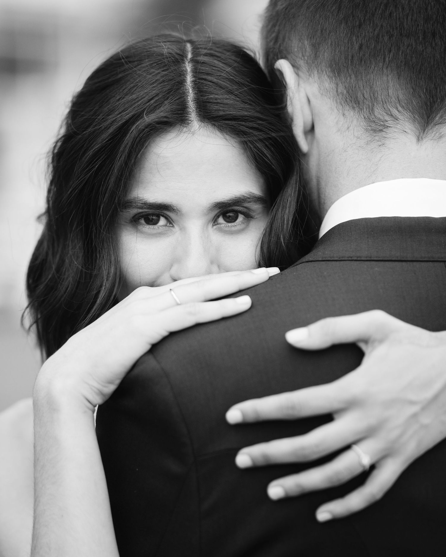 An intimate black and white portrait of a couple embracing during their wedding.Wedding photographer Spain. Galicia.