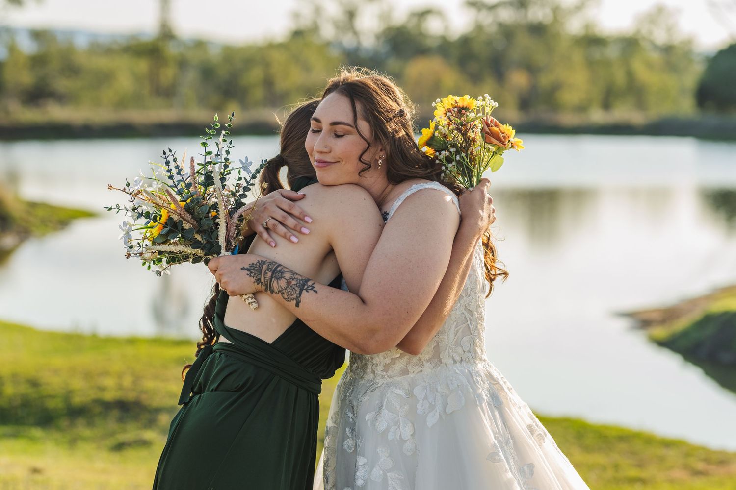 Bride Hugging Bridesmaid