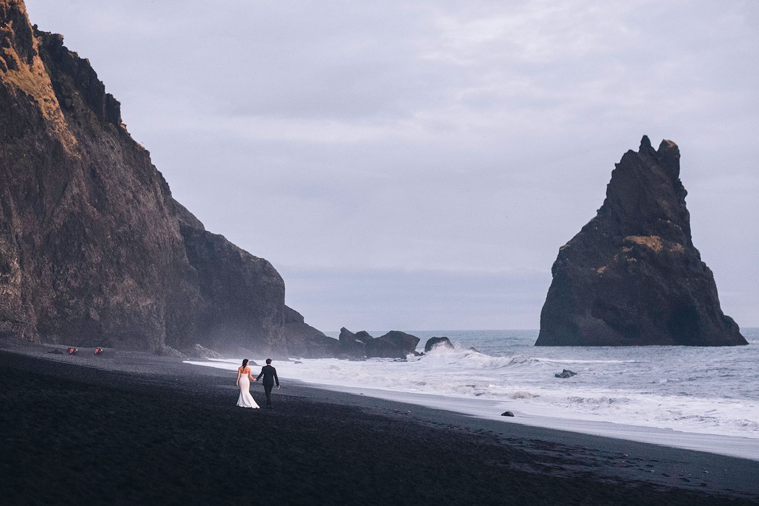 new orleans wedding photographer captures beautiful portrait on beach of iceland.