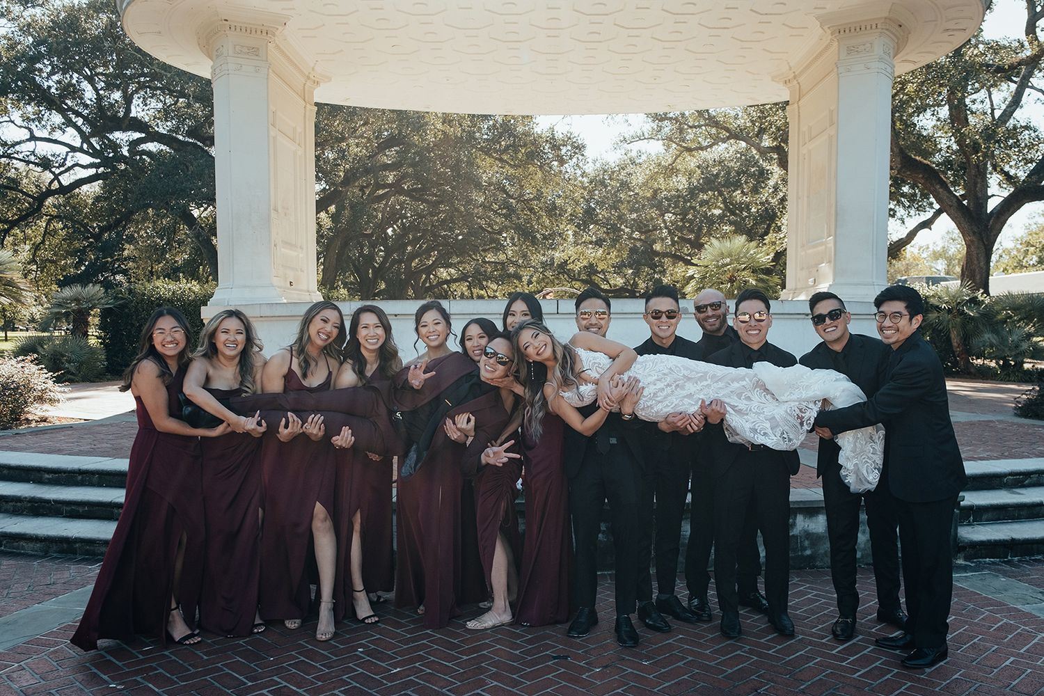 New Orleans wedding party photos with bridal party, bridesmaids, and groomsmen captured in candid and classic group portraits