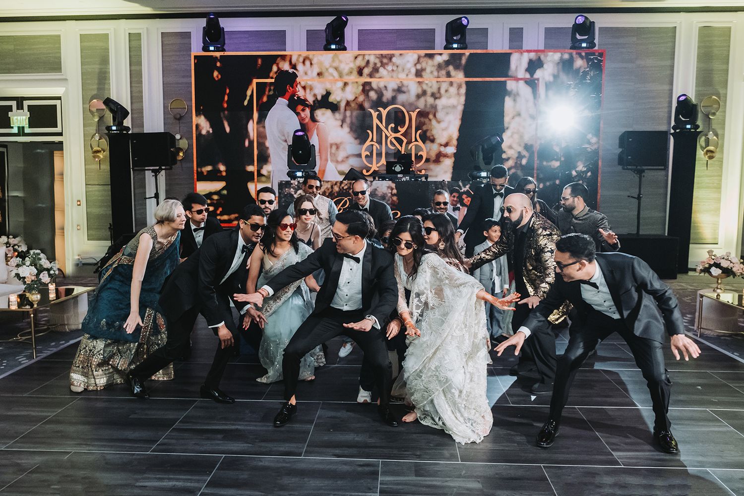 New Orleans indian wedding party photos with bridal party, bridesmaids, and groomsmen captured in candid and classic group portraits