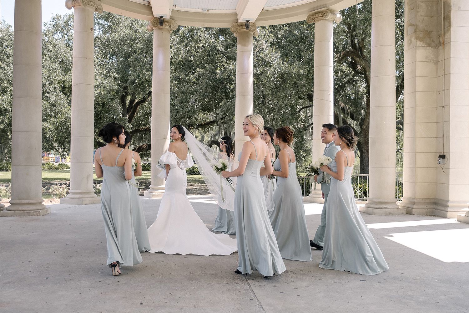 New Orleans wedding party photos with bridal party, bridesmaids, and groomsmen captured in candid and classic group portraits