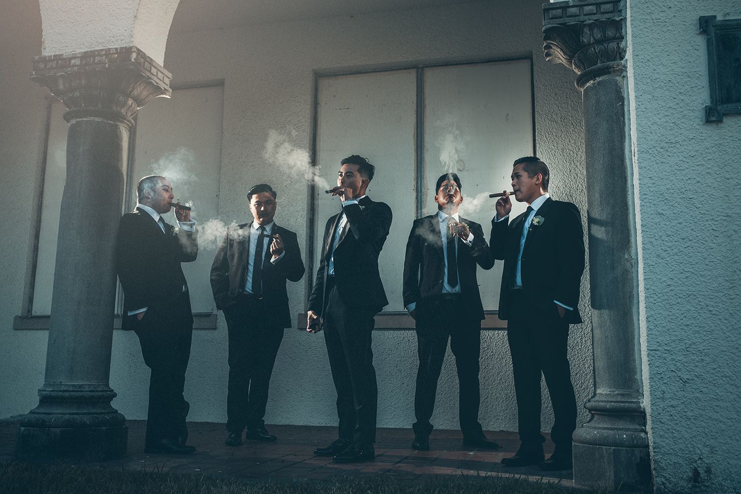 New Orleans wedding party photos groomsmen smoking cigars