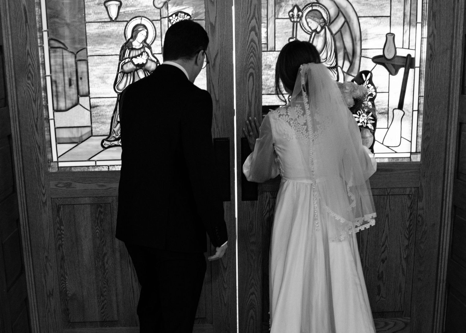 Wausau, Eau Claire, Green Bay, Wisconsin  Midwest Wedding Photography. Catholic Bride and Groom in documentary lifestyle photo.