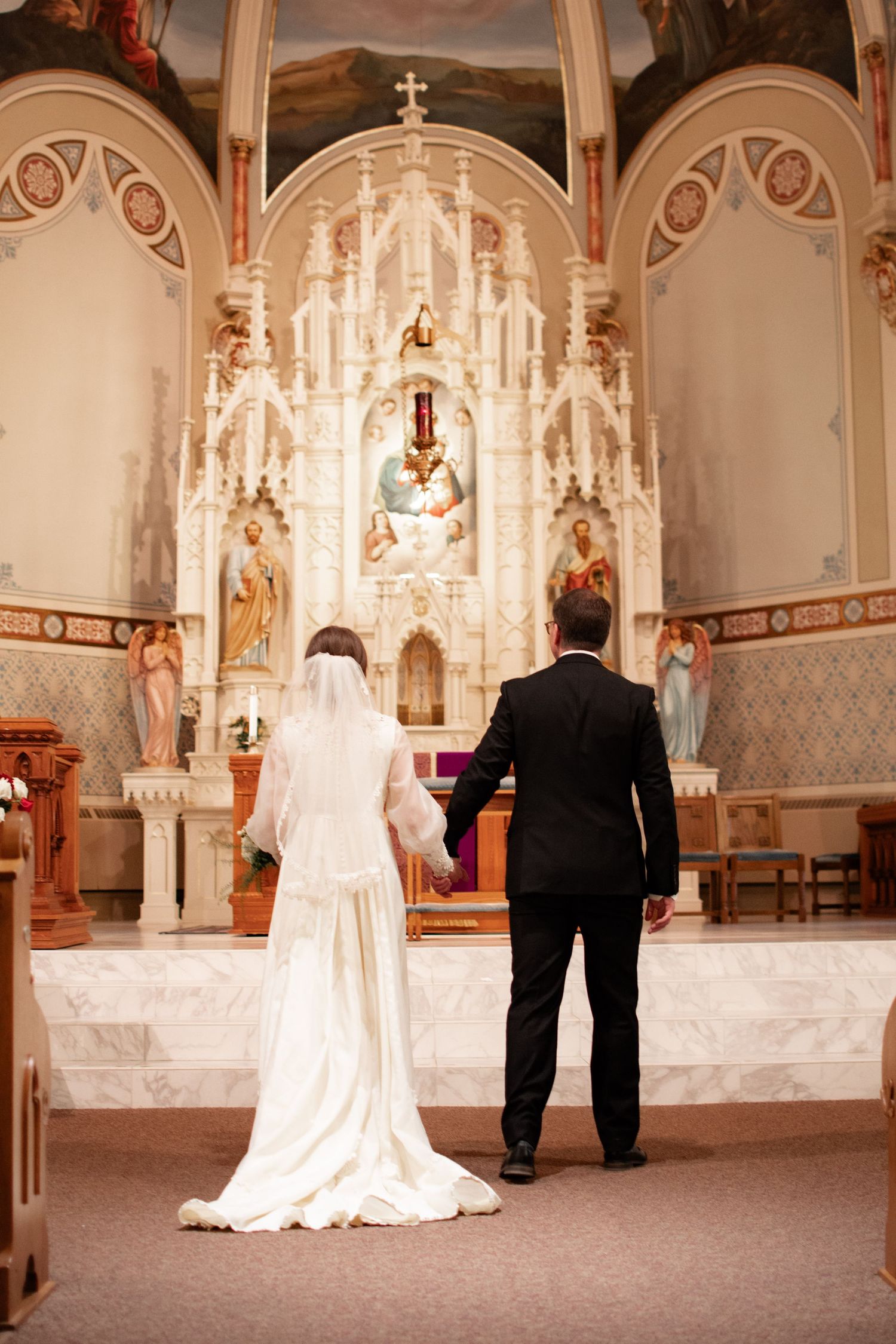 Wausau, Eau Claire, Green Bay, Wisconsin Wedding Photography. Catholic Bride and Groom in documentary lifestyle photo.
