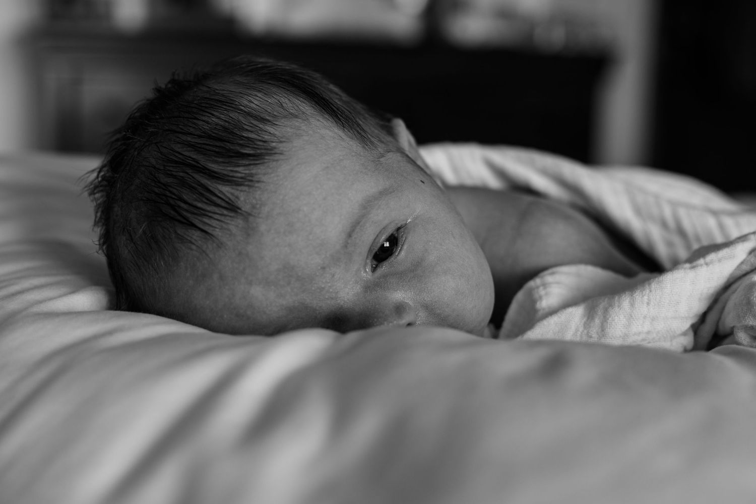 Wausau, Eau Claire, Green Bay, Wisconsin Wedding | Family | Newborn Photography. Newborn in mother's arms. Sweet moment.