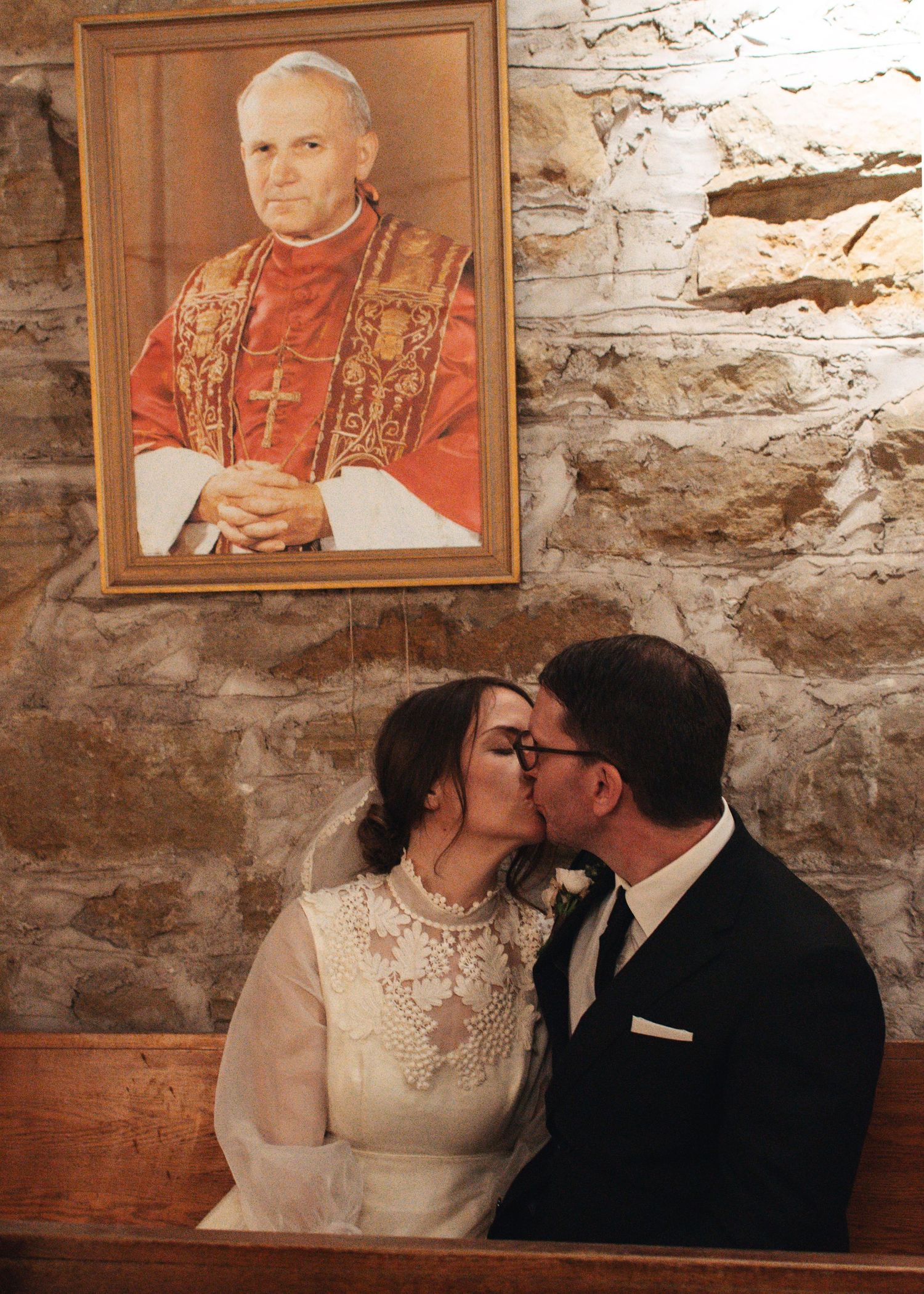 Wausau, Eau Claire, Green Bay, Wisconsin  Midwest Wedding Photography. Catholic Bride and Groom in documentary lifestyle photo.
