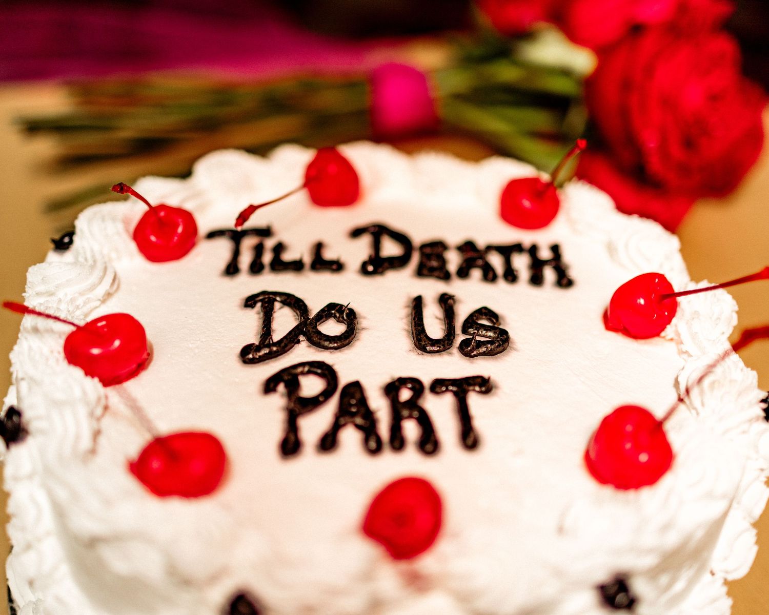 White wedding cake with cherries decorated with 