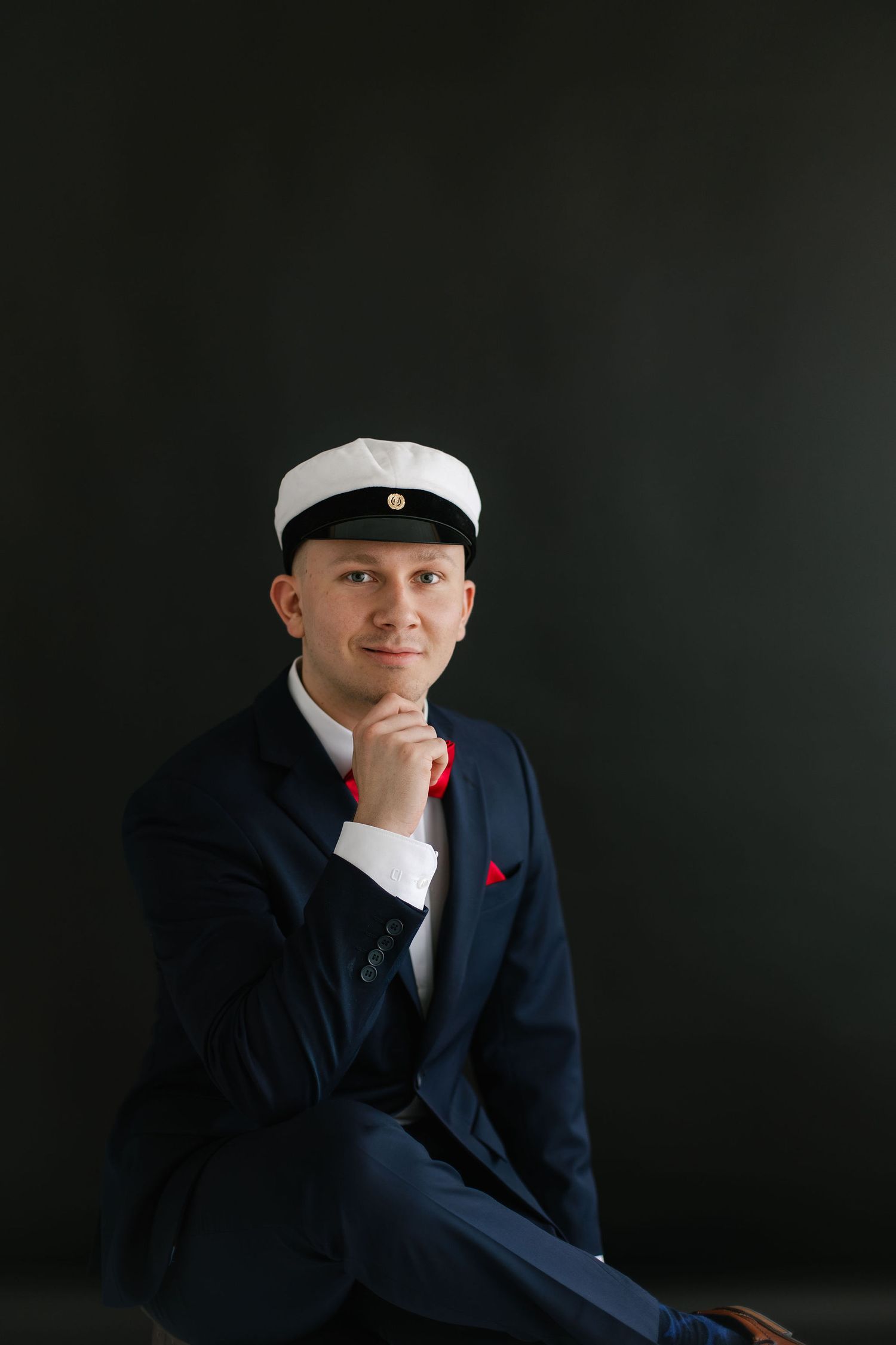 Ylioppilaan kuvaus studiossa