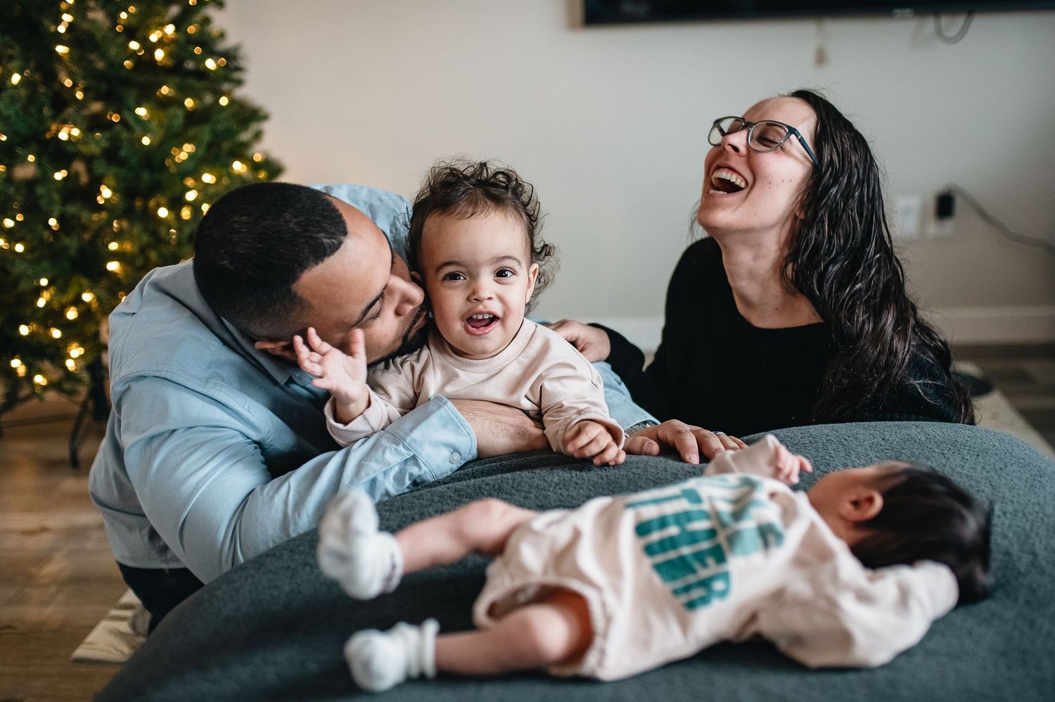 Lifestyle newborn photos inside the comfort of you home. Documenting the newborn stage and all of your family's first moments. Siblings meet