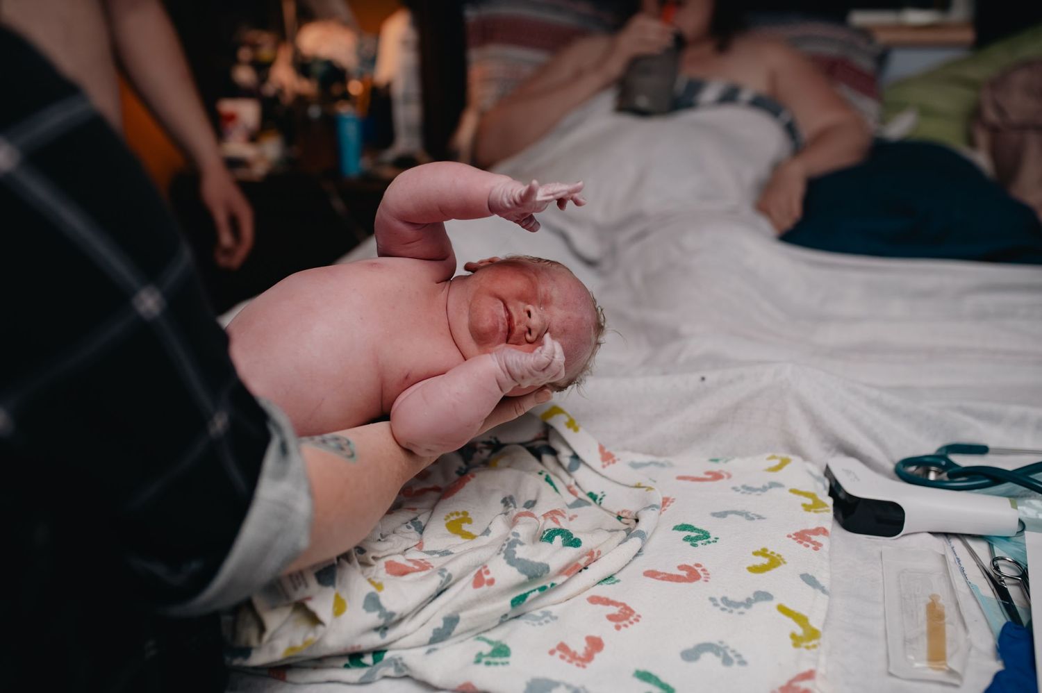 Posterior home birth with Moonsisters midwifery in Hillsboro, OR. Newborn screening in the comfort of home with mom in bed. Intimate birth