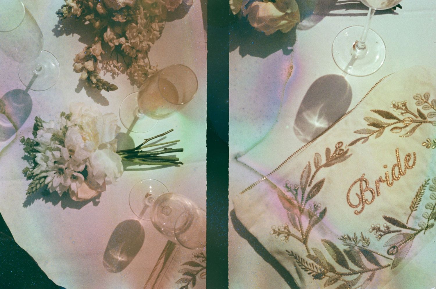Elegant wedding decor details featuring delicate floral arrangements and personalized bride signage.