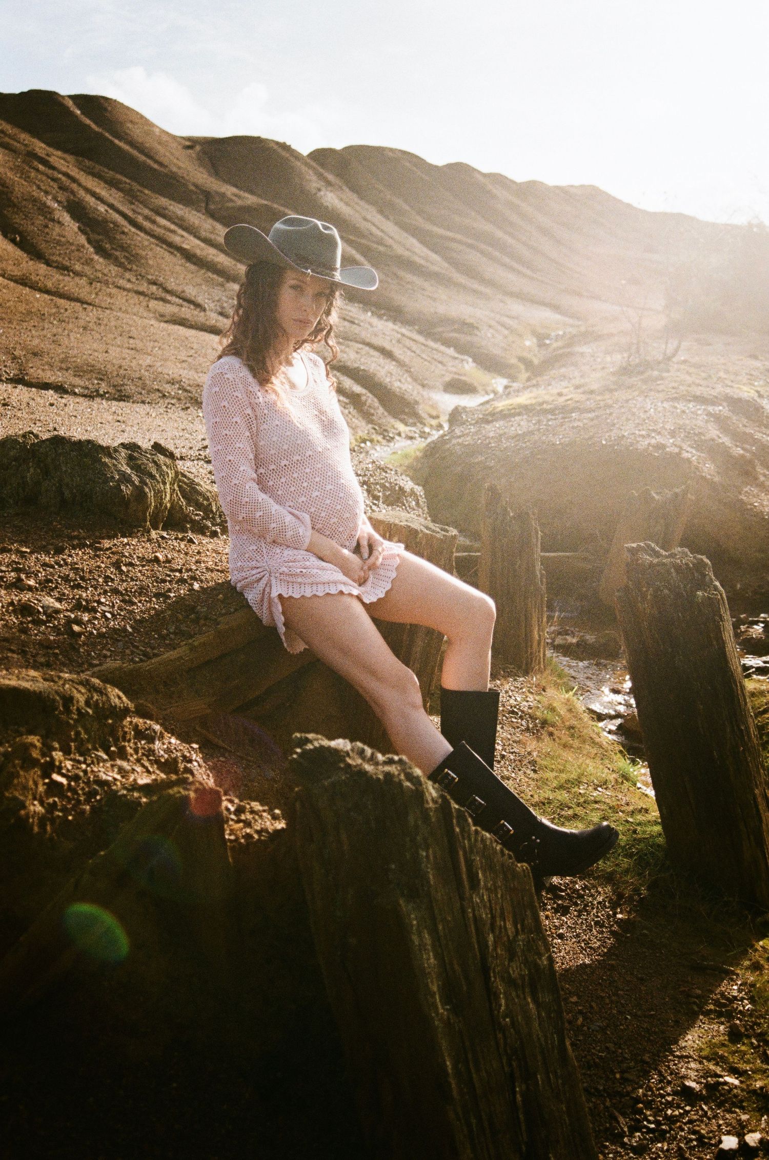 Sunset photos on rocky coastal cliffs with dramatic golden hour lighting.