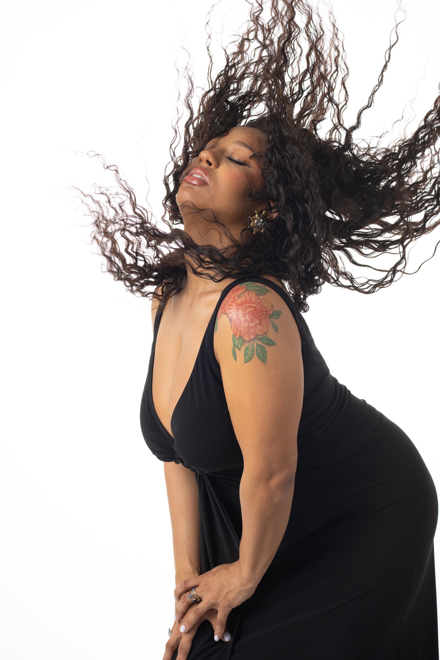Dynamic portraits with flowing hair movement against white background.