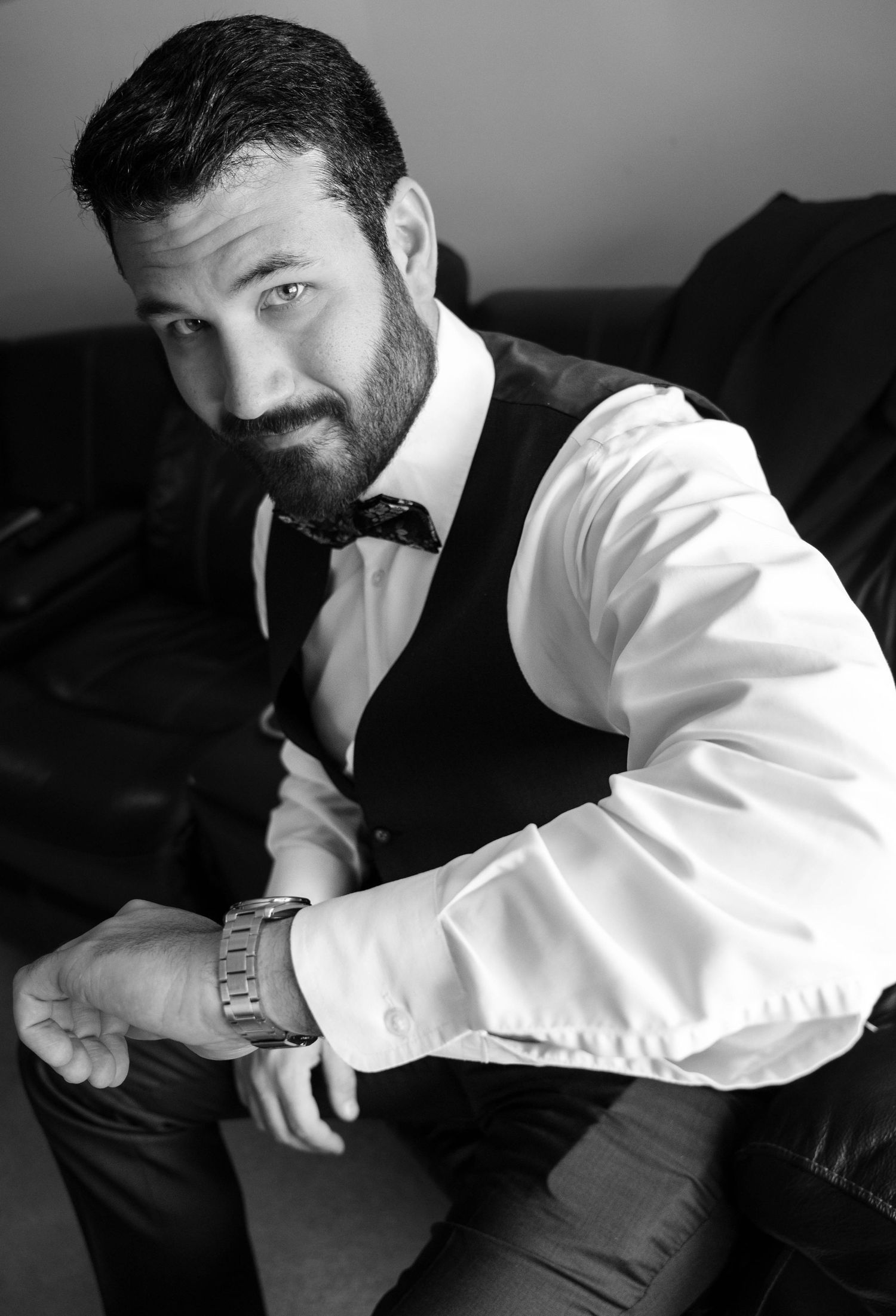 Black and white portraits showing preparation moments in dramatic lighting.