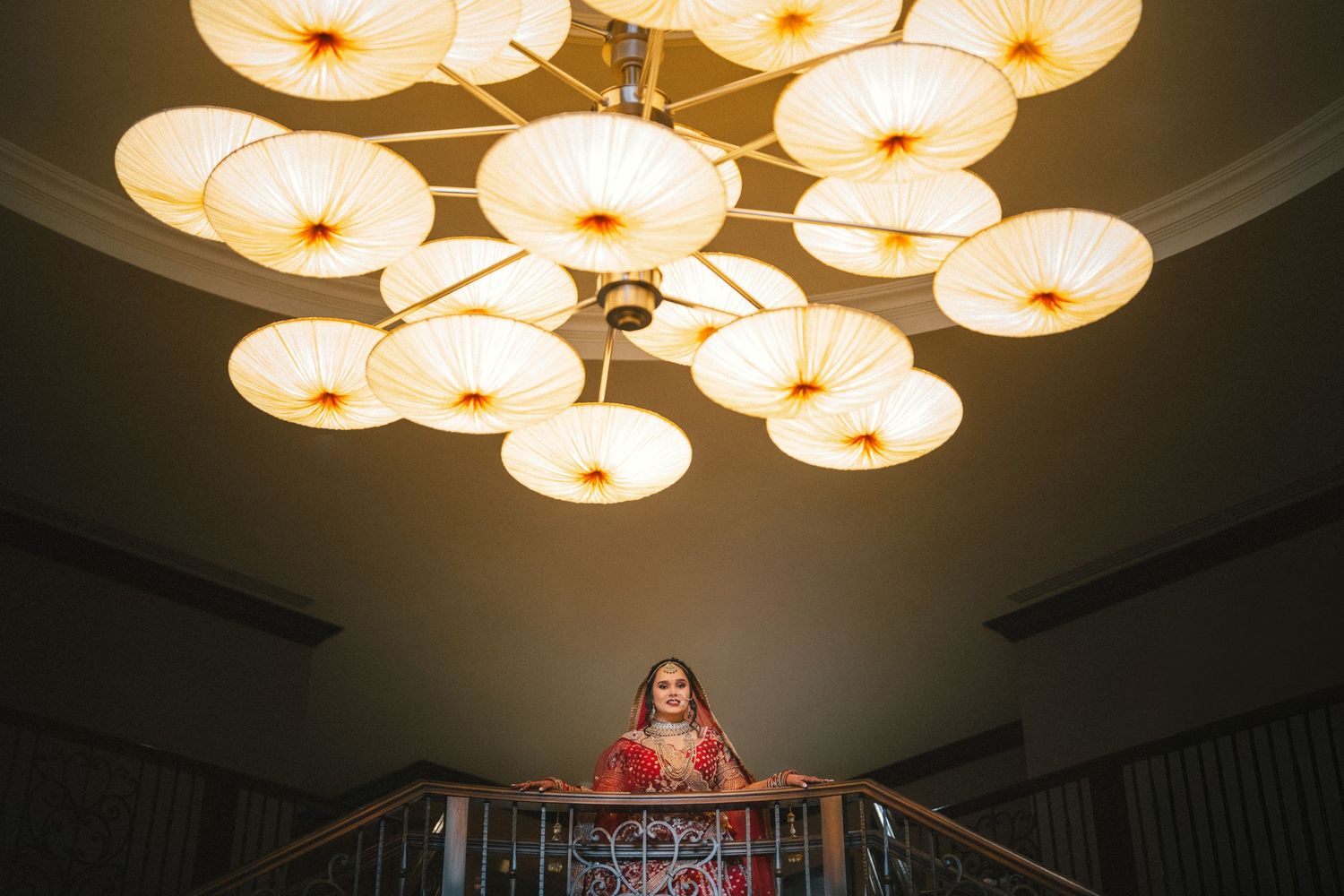 Elegant ceiling with multiple circular light fixtures creating warm ambiance.