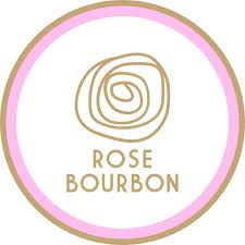 A series of gold and pink oval wine label icons featuring bourbon, rose, and other beverage types arranged in a row.