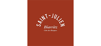 A minimalist red square logo for Saint-Julien restaurant featuring white text and 'Cote des Basques' tagline.