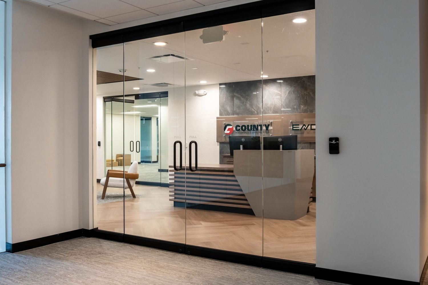 Modern office lobby photographed for commercial real estate marketing.