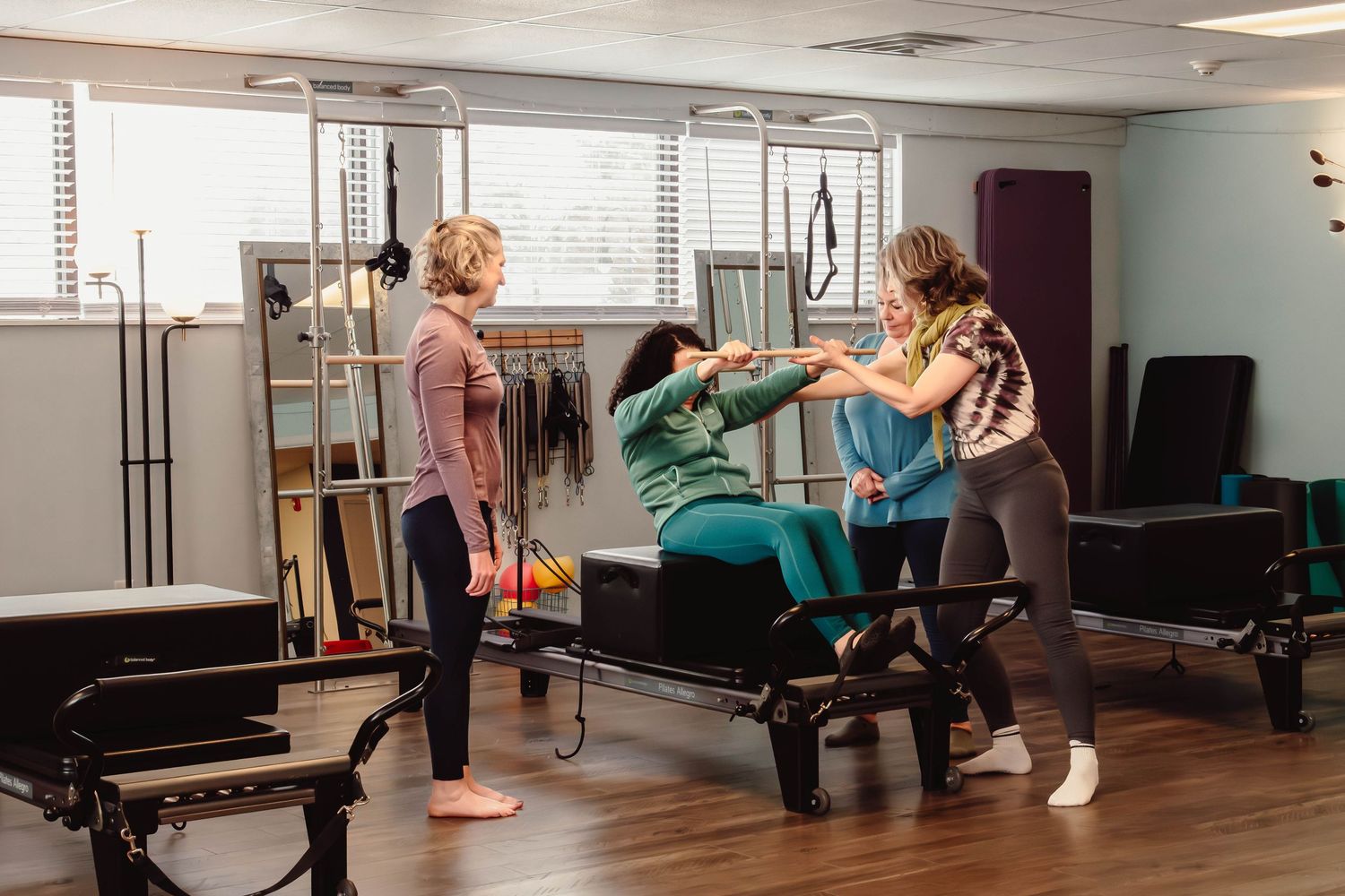Modern Pilates studio with reformers photographed for a boutique fitness business.