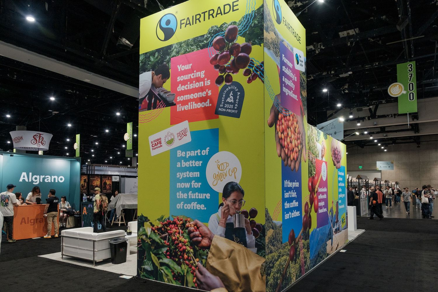 Fairtrade exhibition booth at a trade show promoting sustainable coffee farming practices.