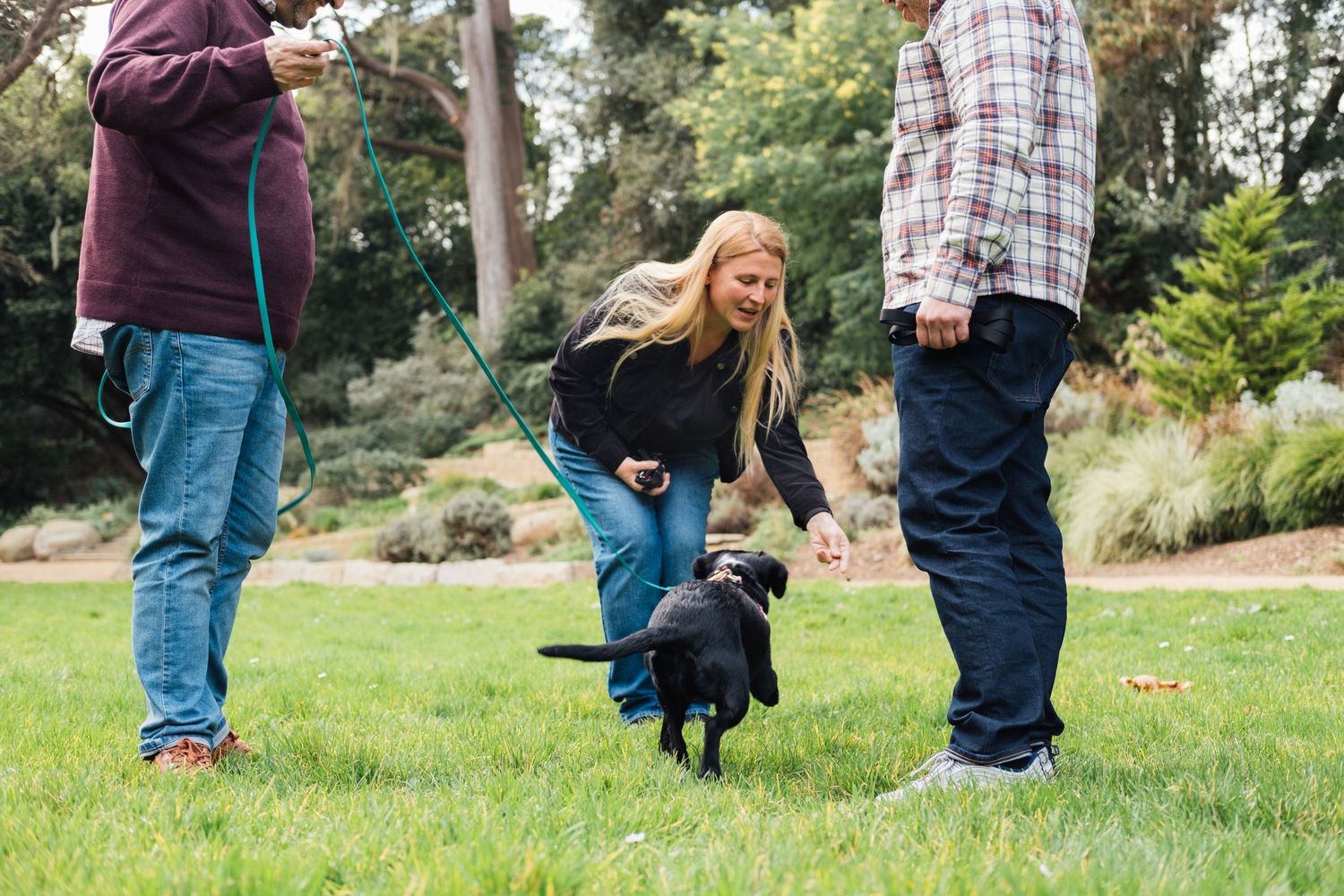 SF dog trainer and behaviorist in a training session for professional personal branding photography session. Outdoors in Golden Gate Park