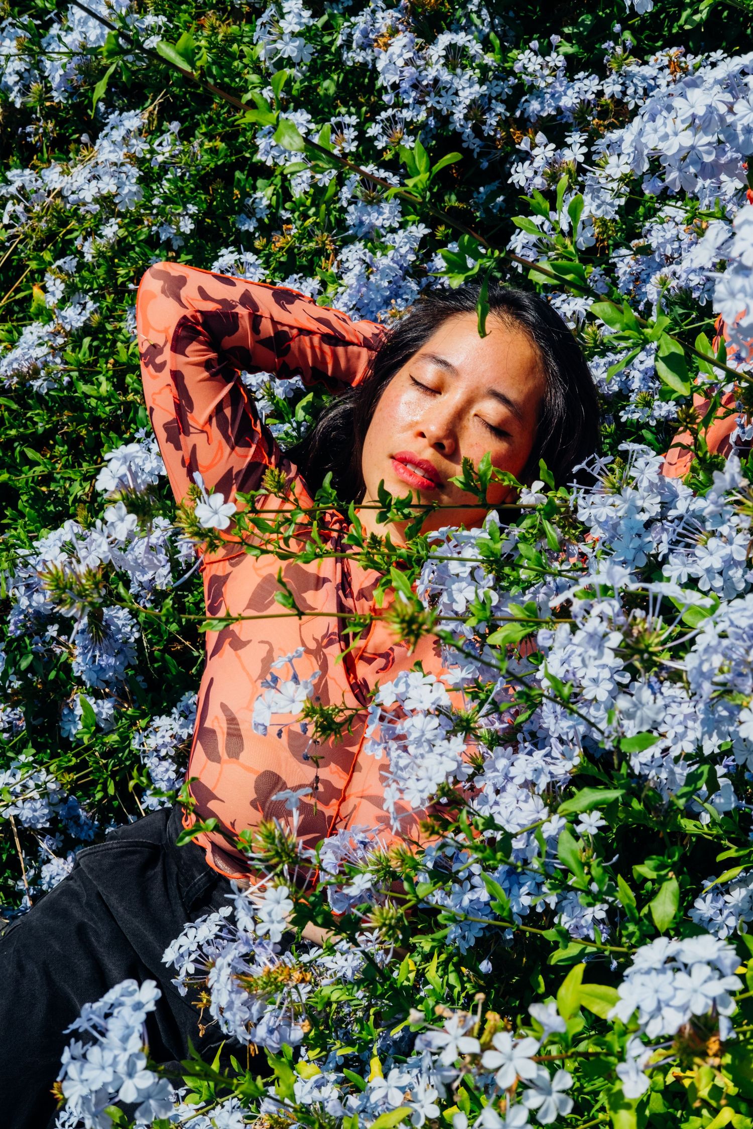 Colorful, outdoor, lifestyle portrait of creative small business owner taken by professional photographer Jenn Chen in San Francisco